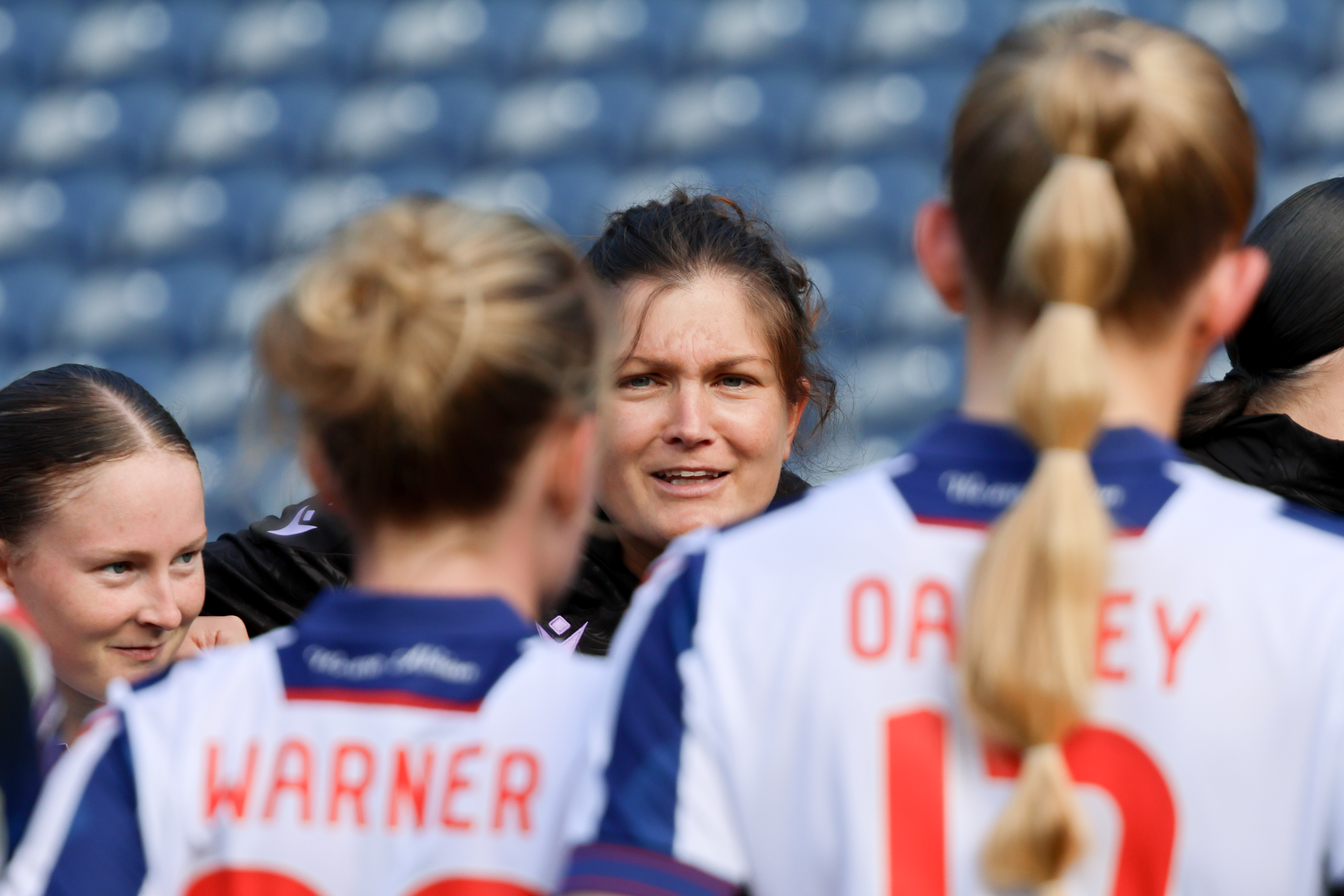 Siobhan Hodgetts-Still talking to her players at The Hawthorns 