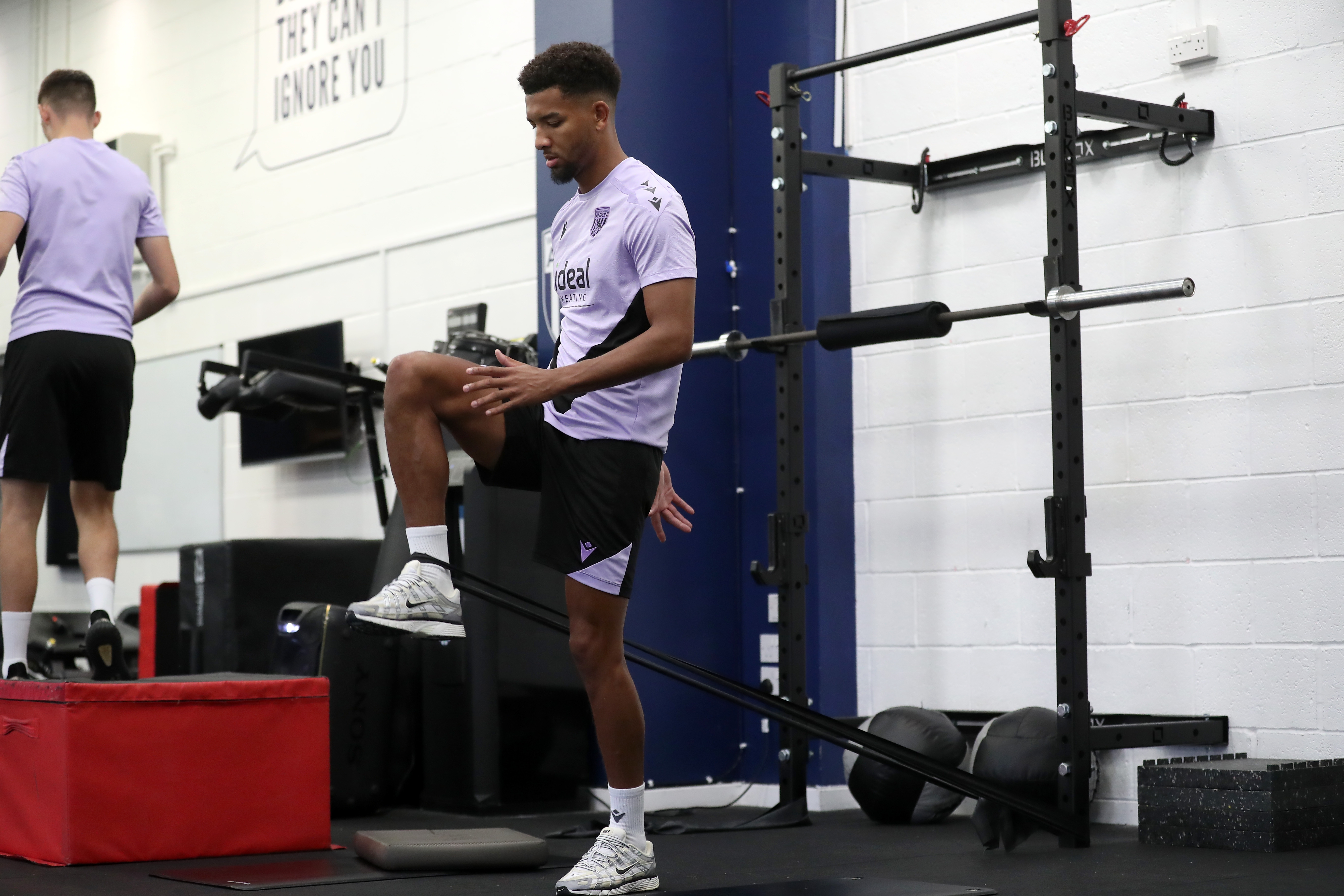 Mason Holgate stretching in the gym