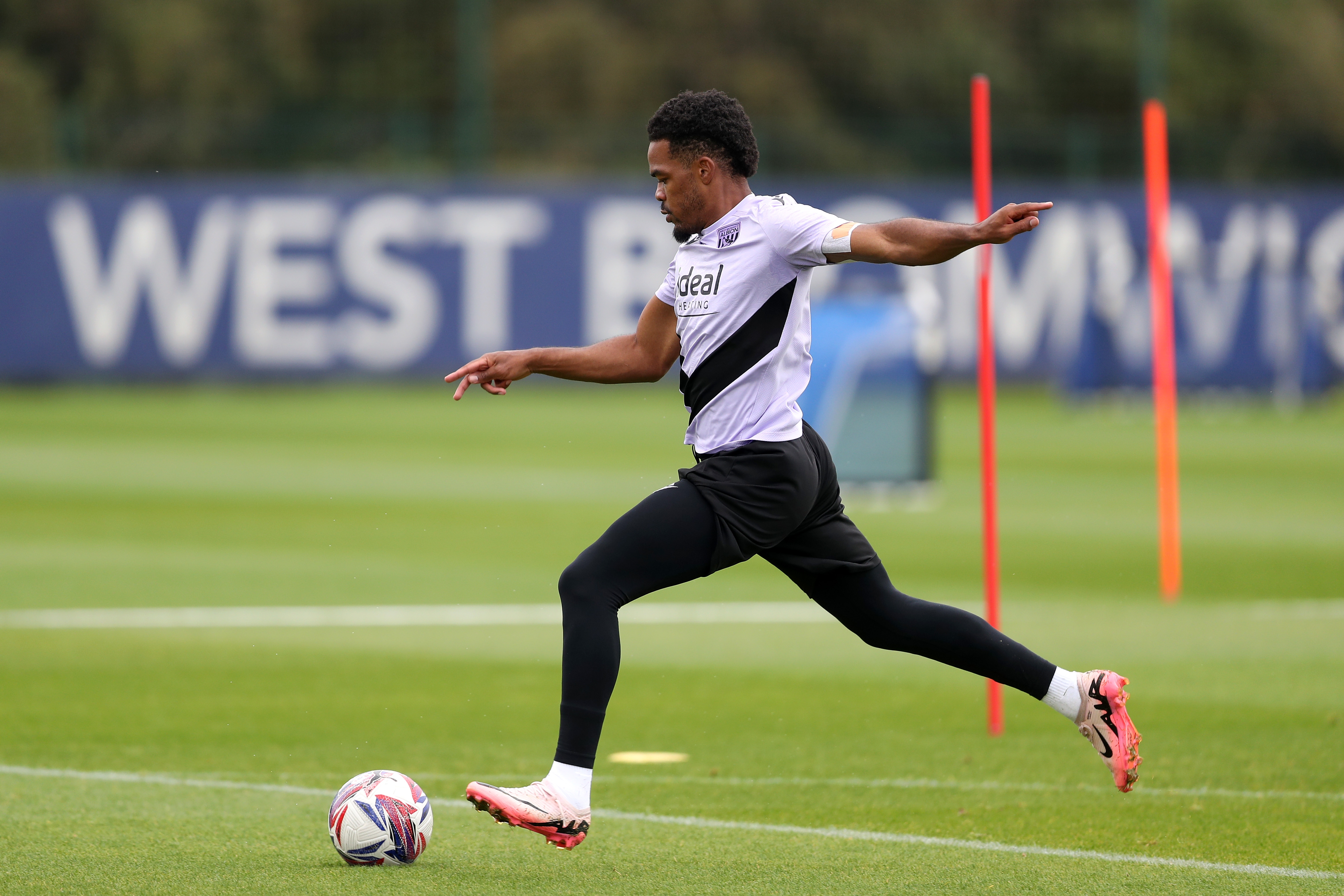 Grady Diangana striking the ball during a training session