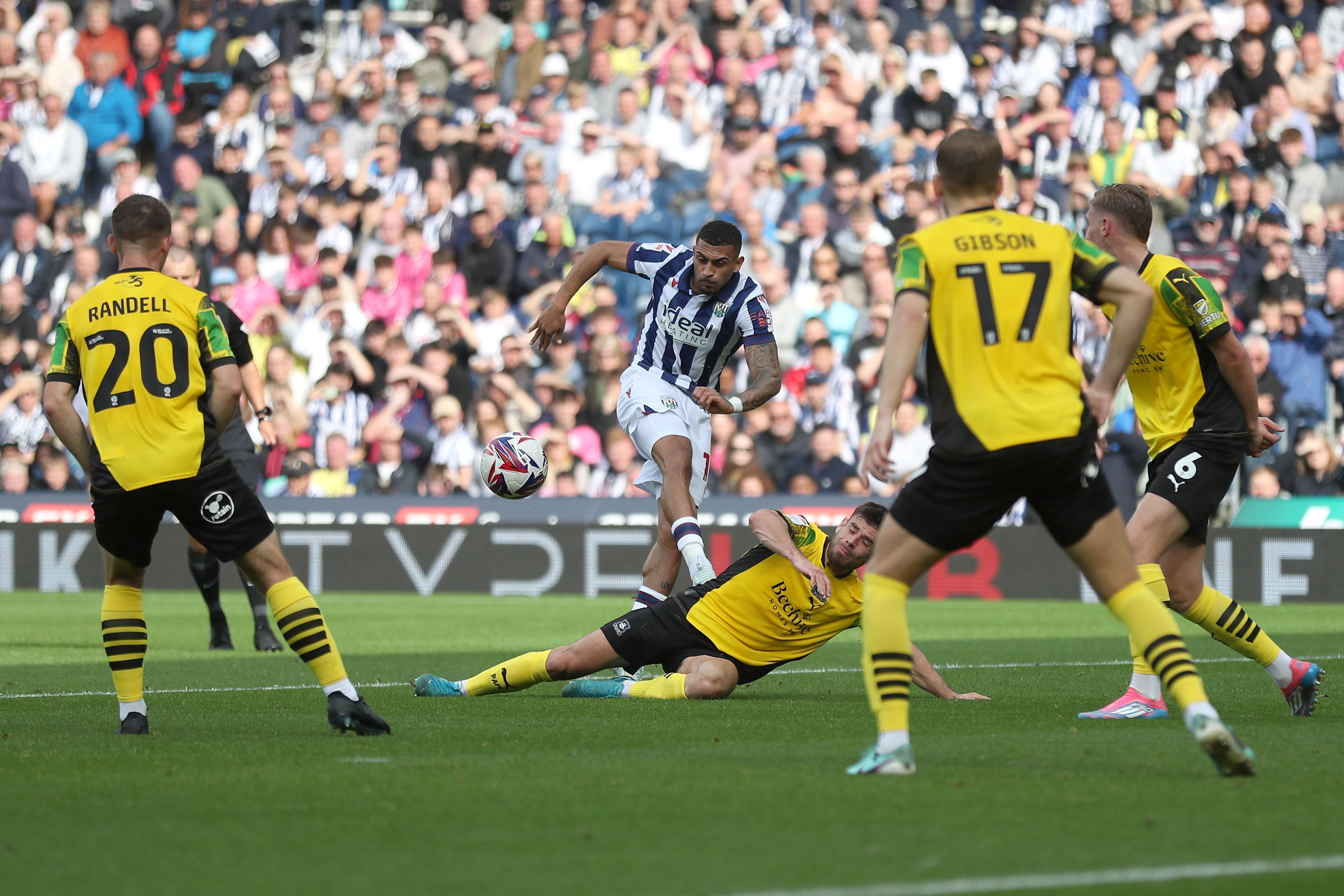 Karlan Grant shoots at goal against Plymouth 