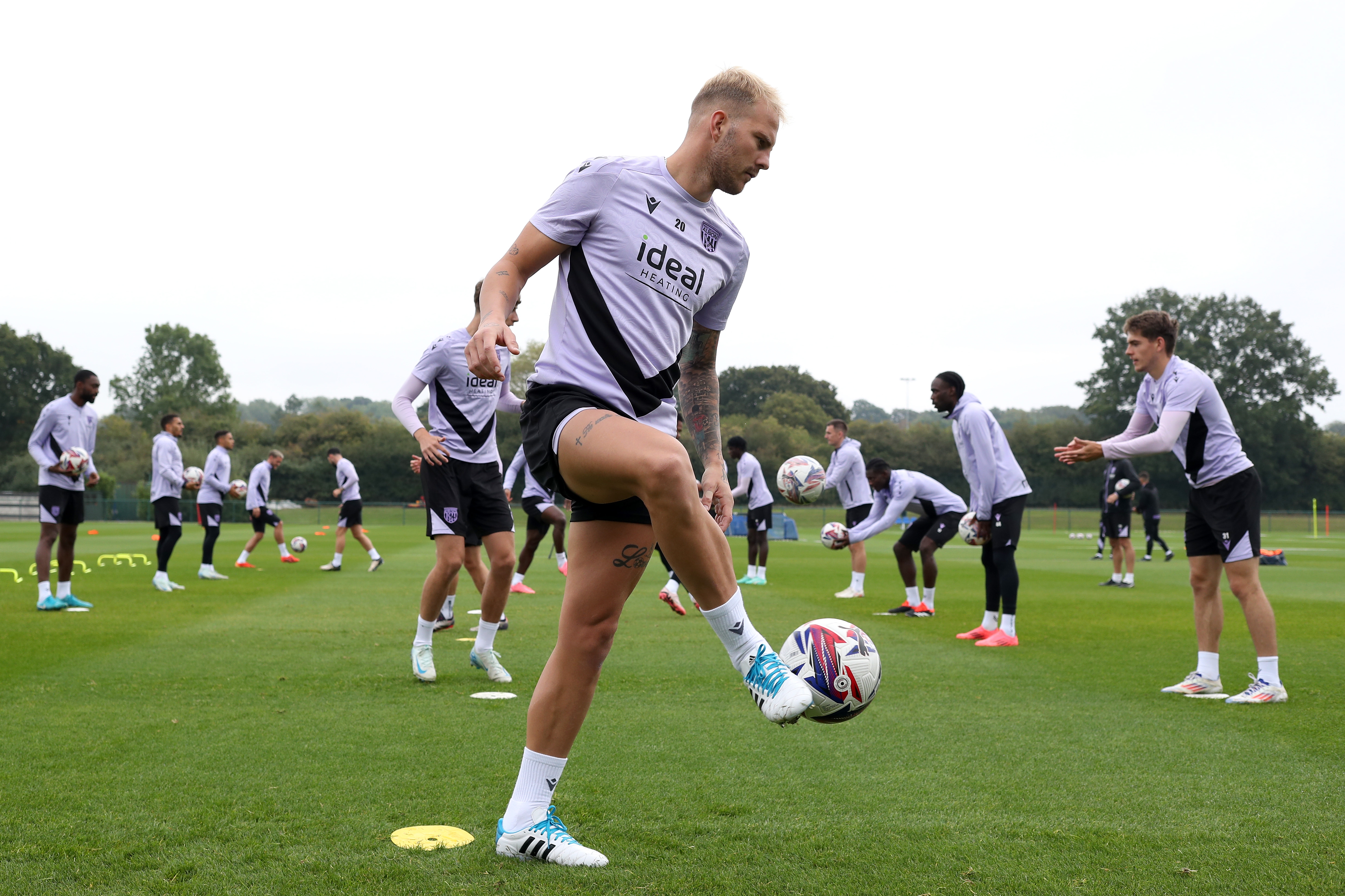 Uroš Račić passing a ball during a training session 