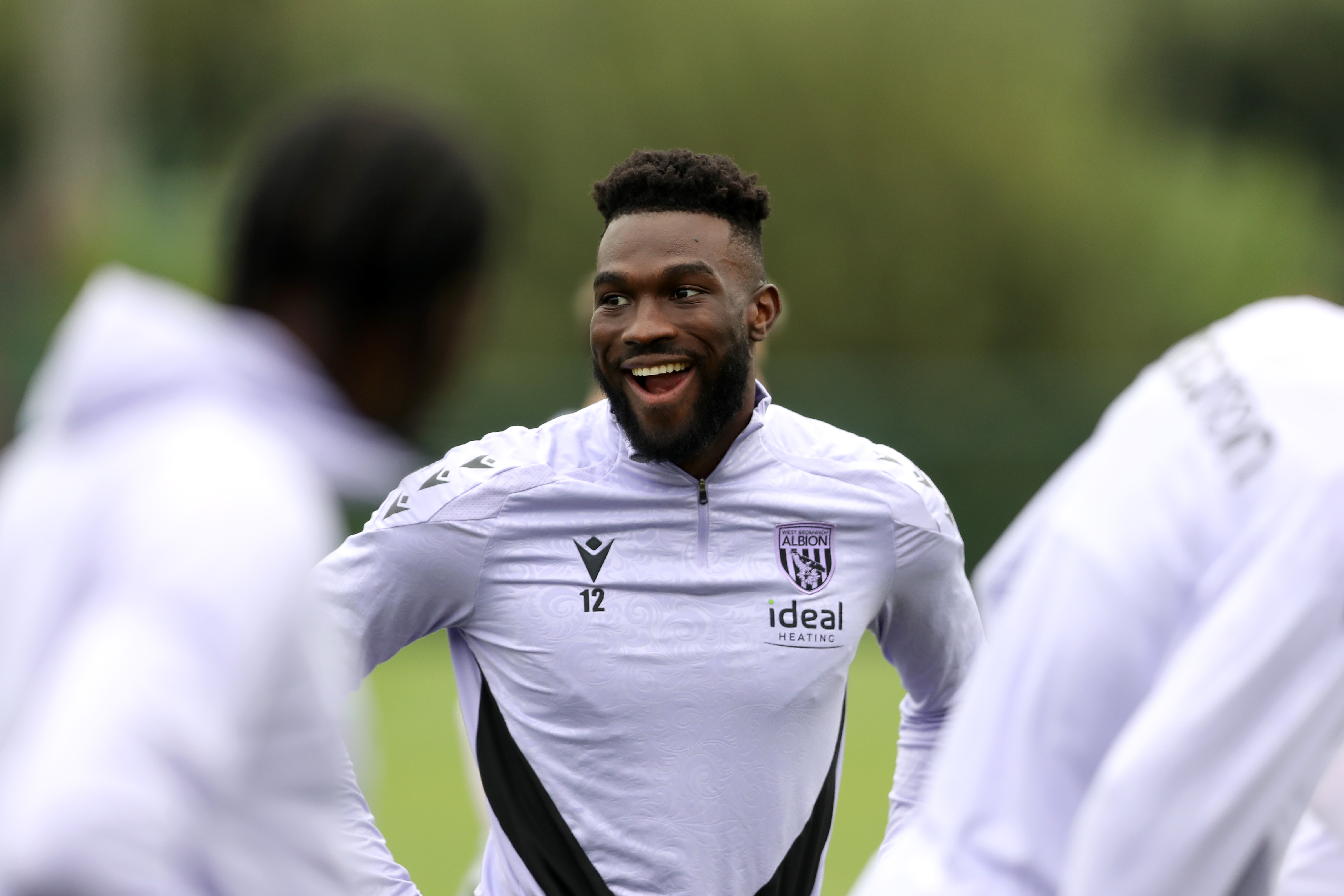 Daryl Dike smiling during a training session 