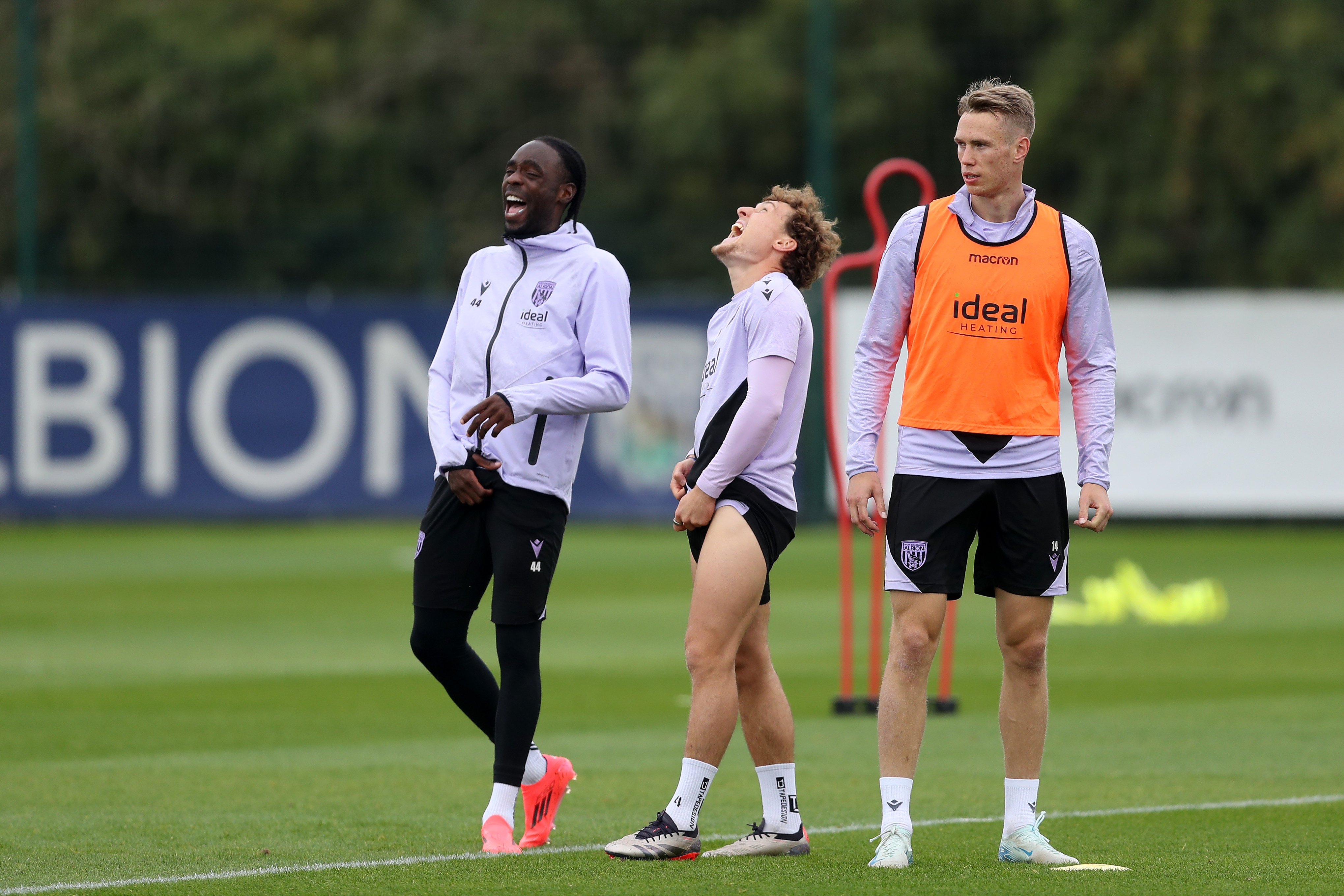 Callum Styles and Devante Cole laughing during a training session 