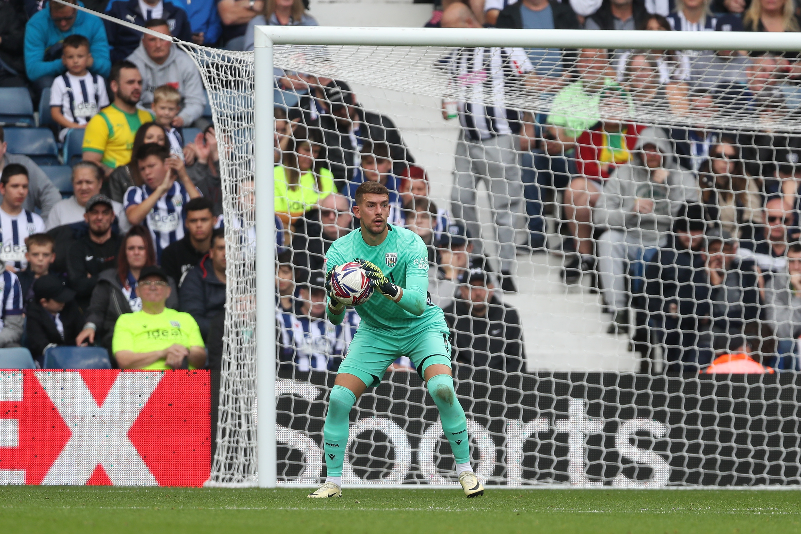 Alex Palmer with the ball in his grasp against Plymouth 