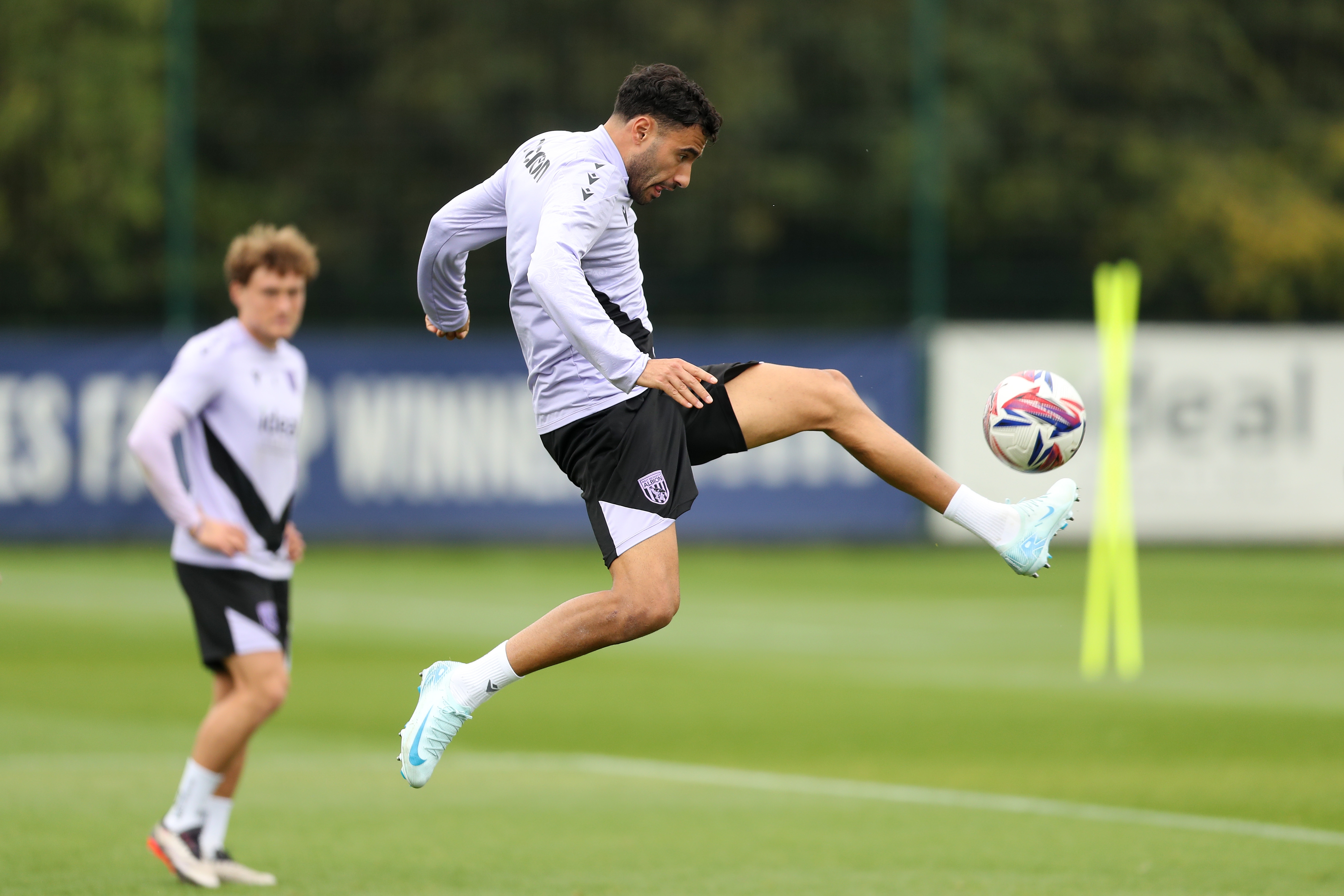 Gianluca Frabotta jumps to control a ball during a training session 