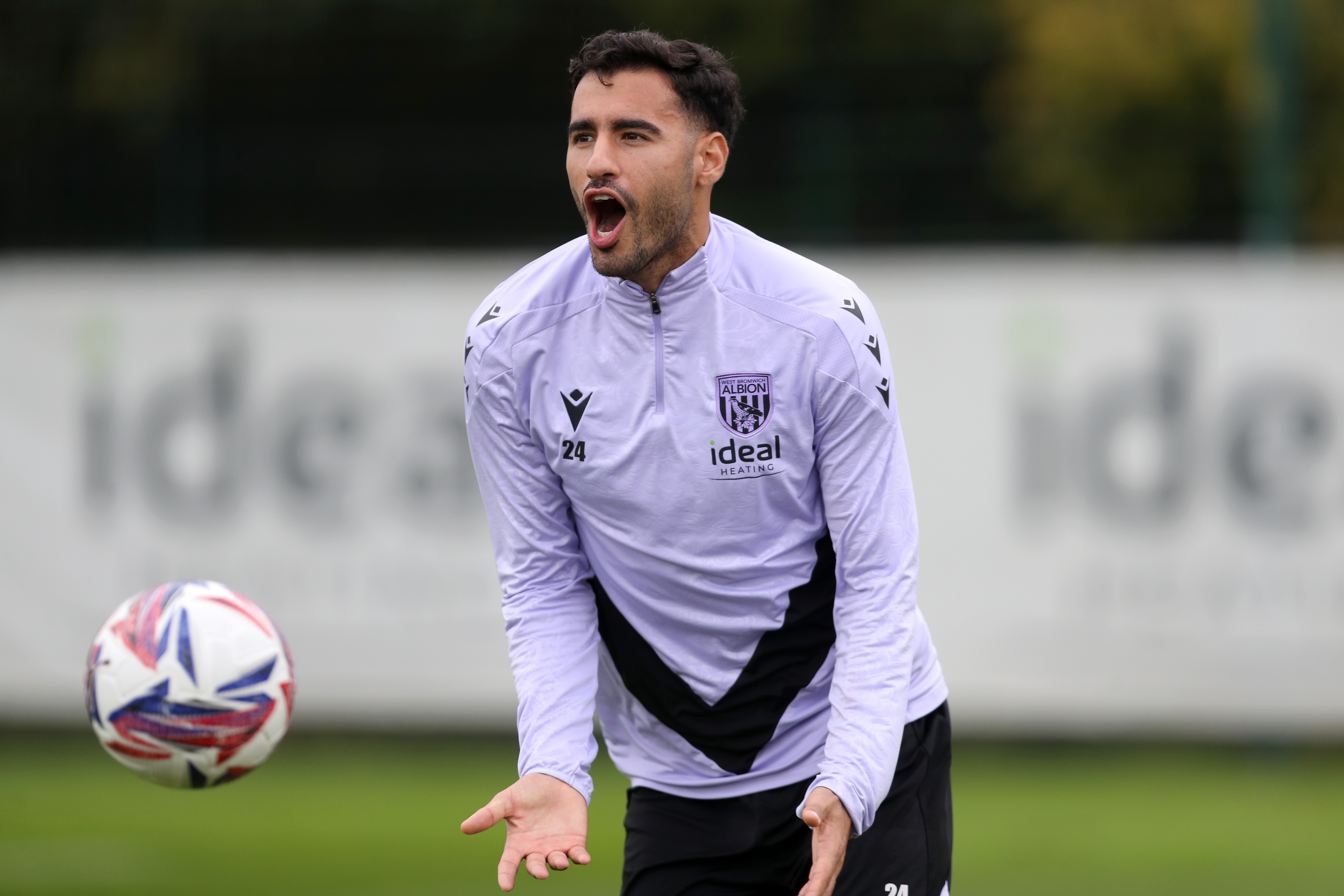 Gianluca Frabotta with his mouth open during a training session 