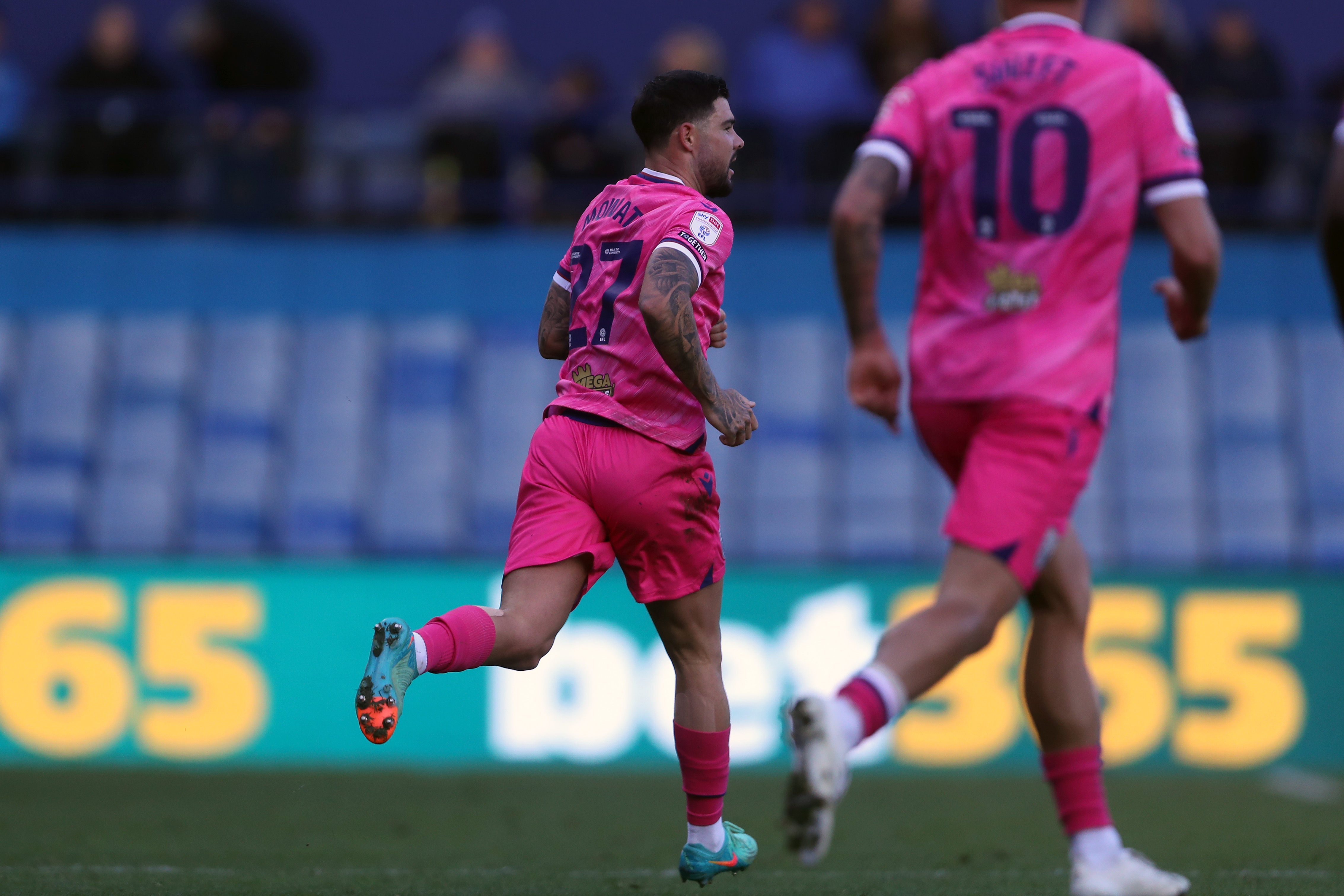 Alex Mowatt in action for Albion at Sheffield Wednesday in the pink away kit 