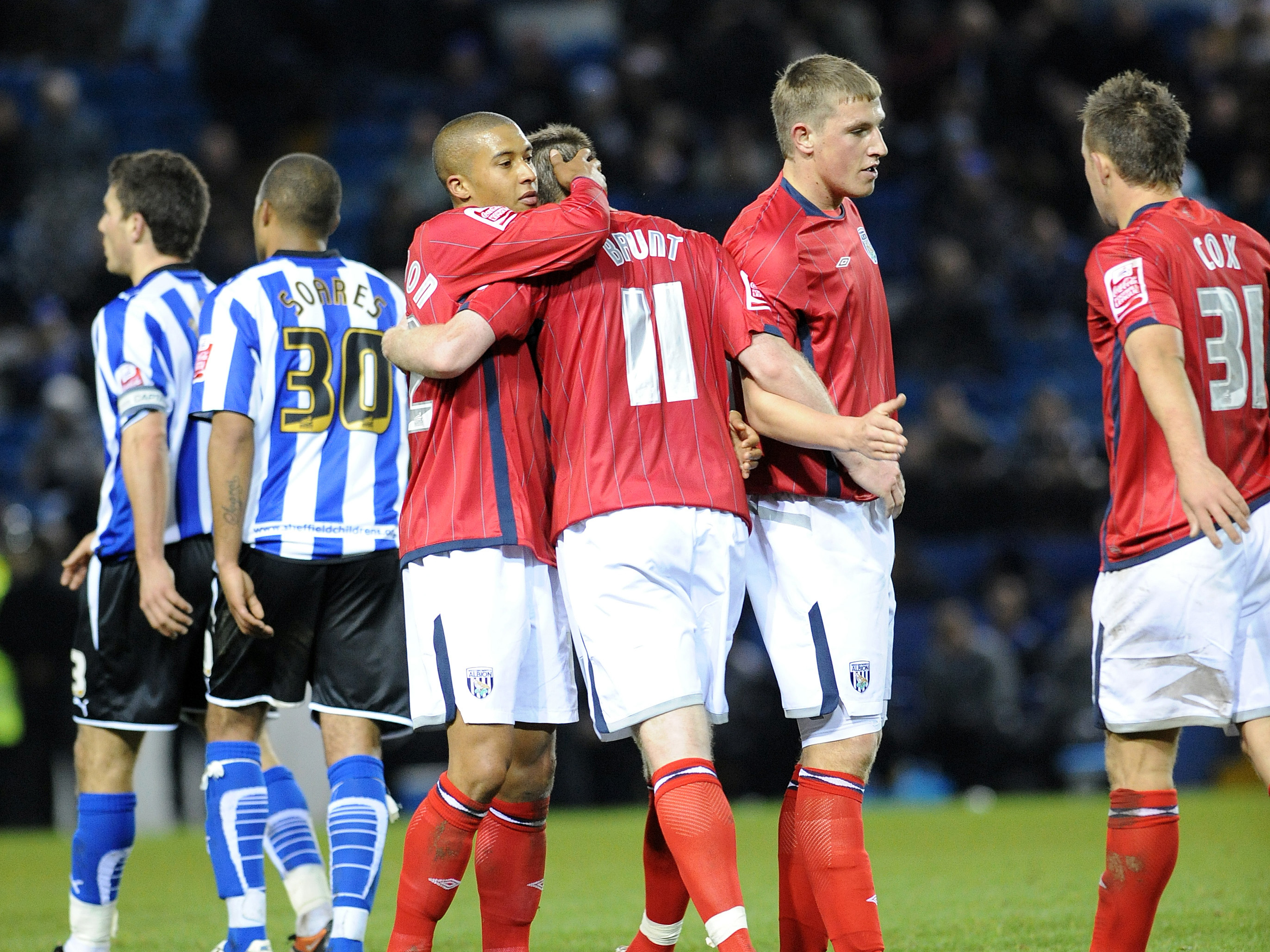 Chris Brunt celebrates with team-mates after scoring for Albion at Sheffield Wednesday in 2009