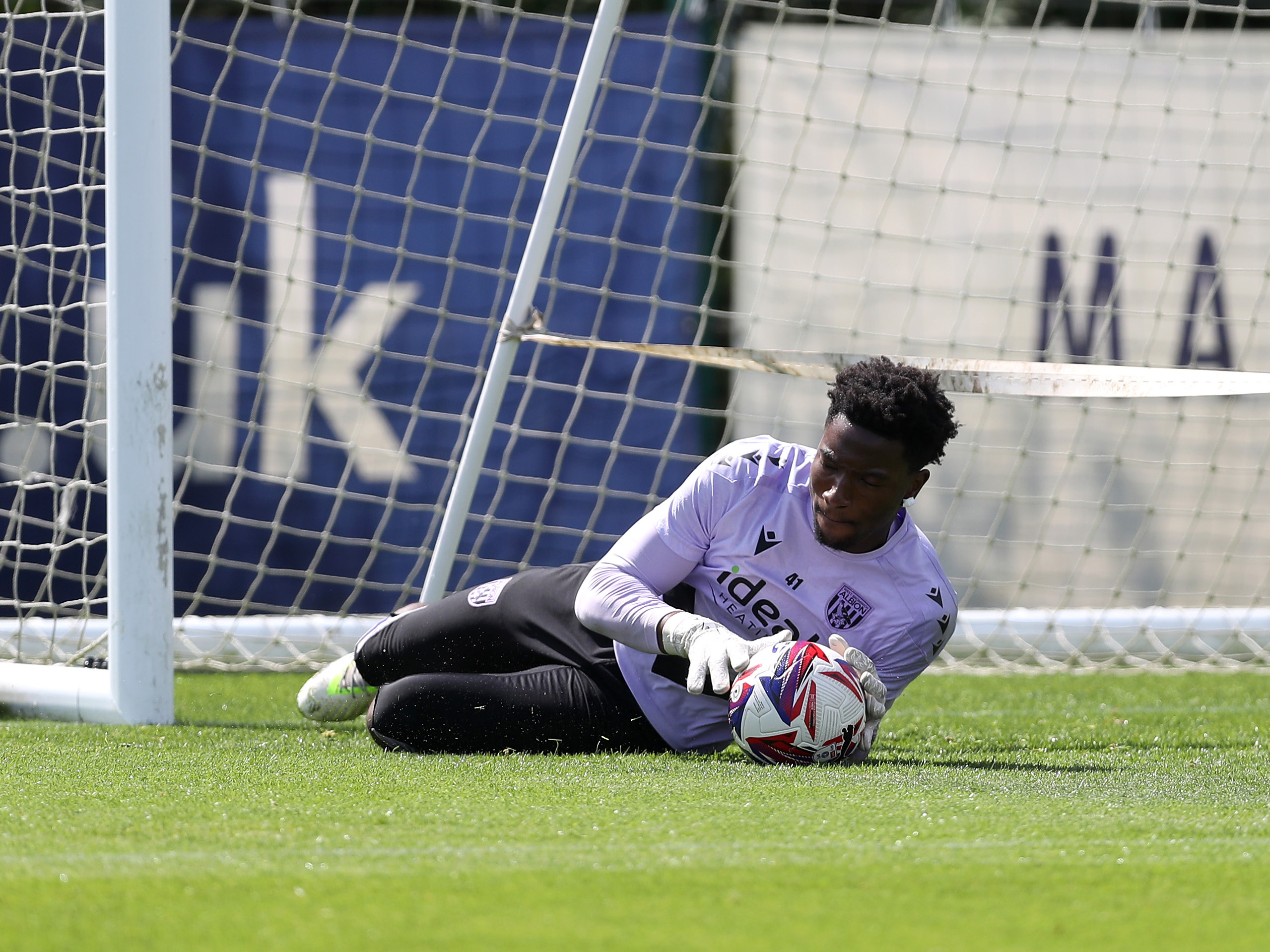 A photo of Albion academy goalkeeper Ben Cisse in the 2024/25 purple trainingwear