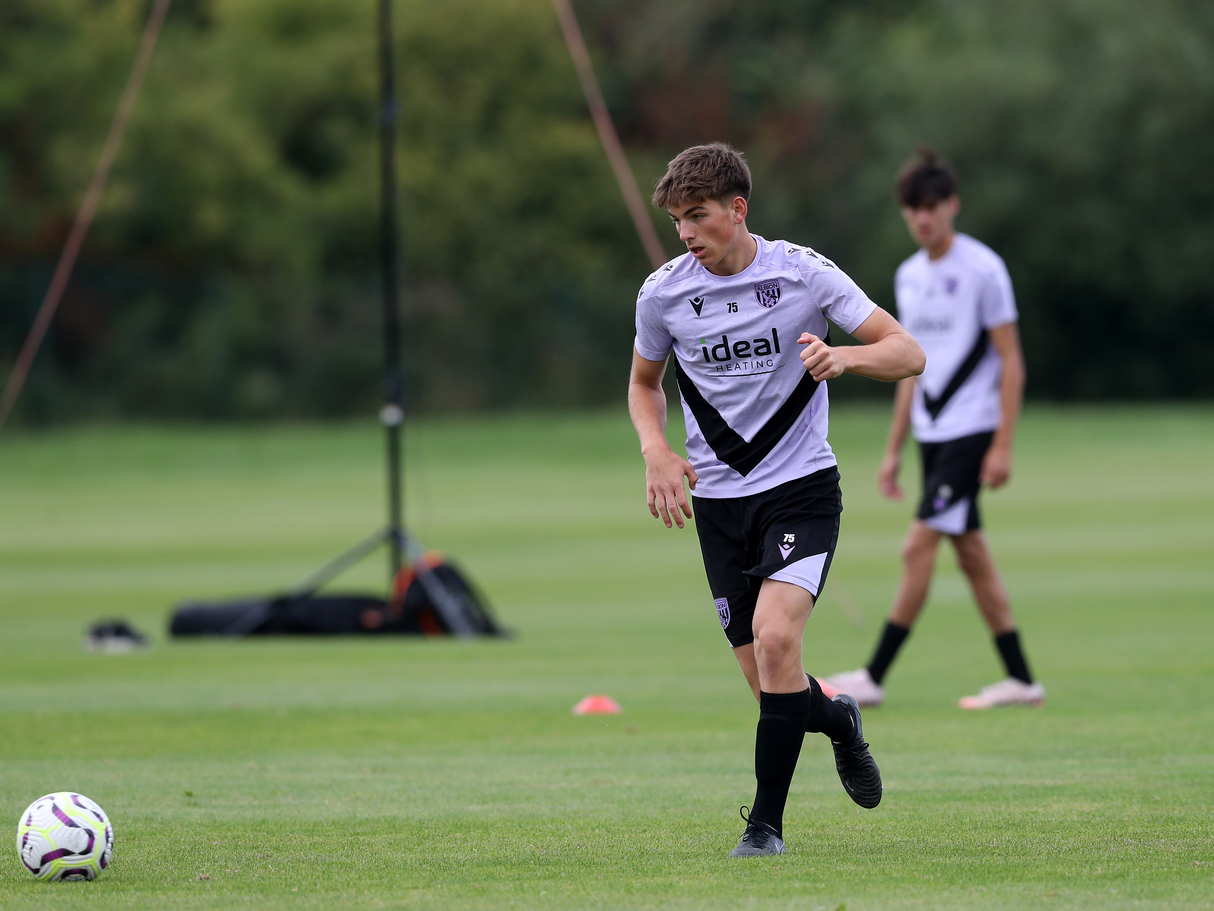 A photo of Albion youngster Charlie Blackshields in the 2024/25 purple trading wear