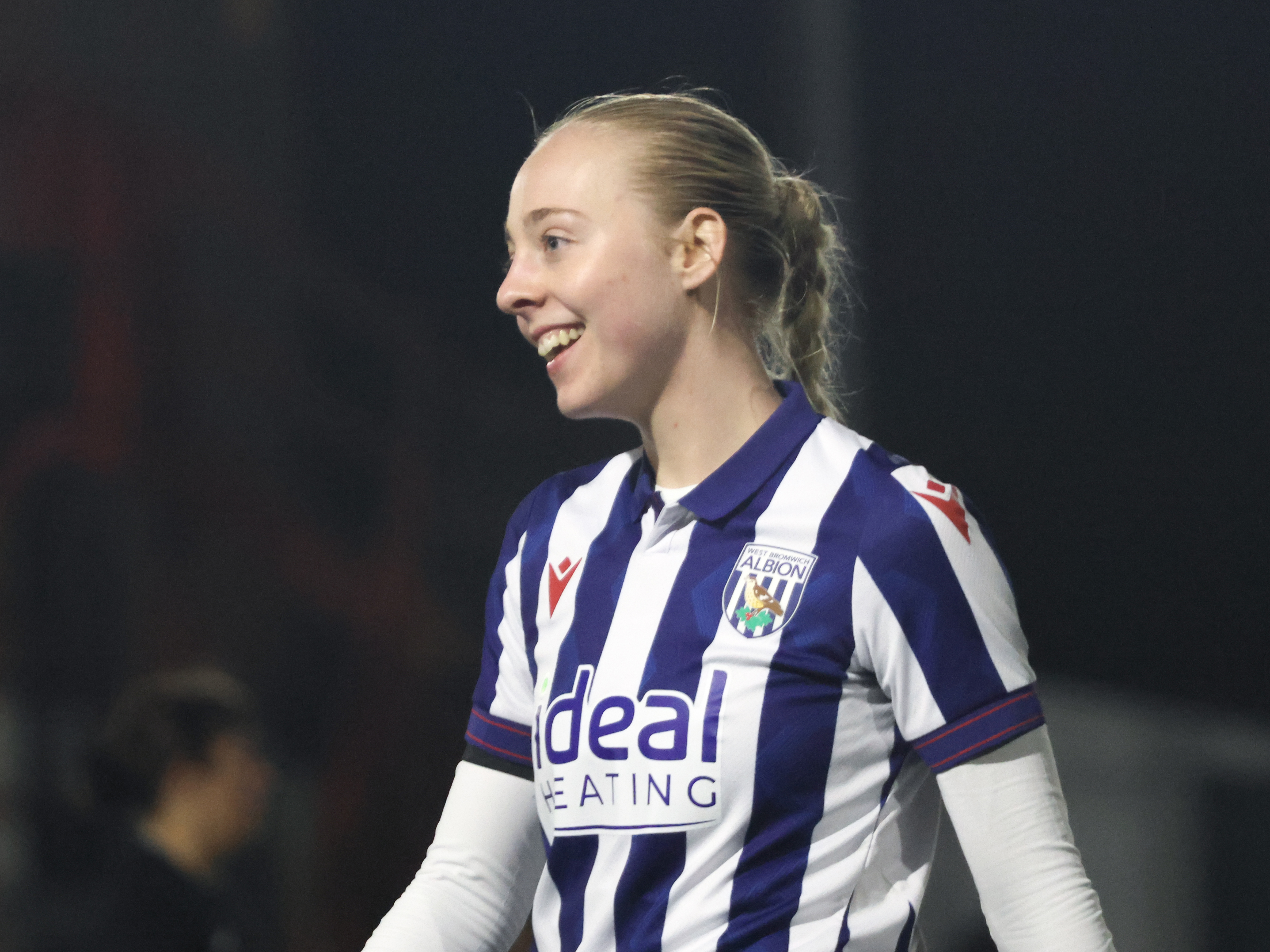 An image of Ellie May smiling after scoring twice against Stourbridge for Albion Women