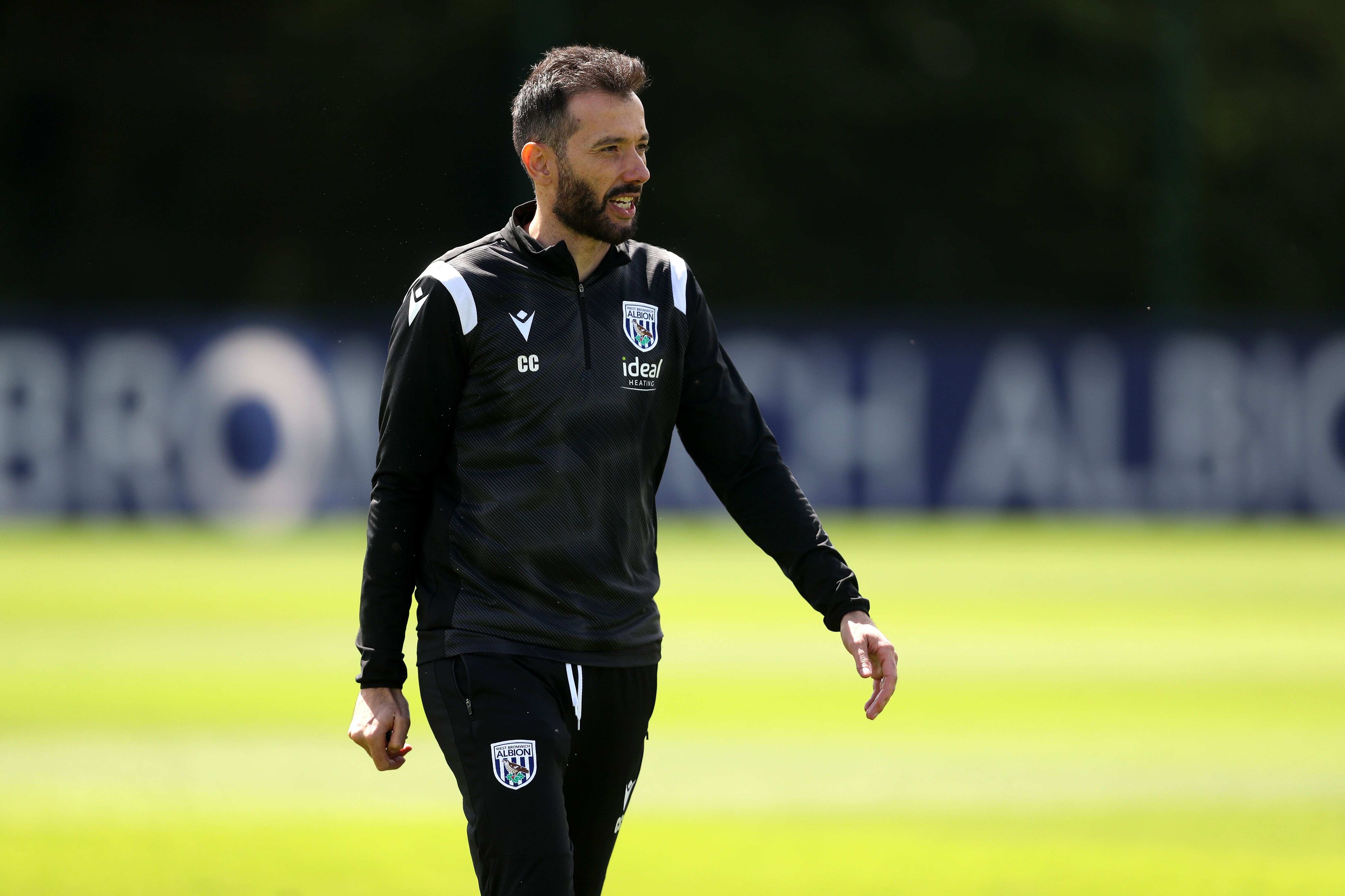 Carlos Corberán watching training 