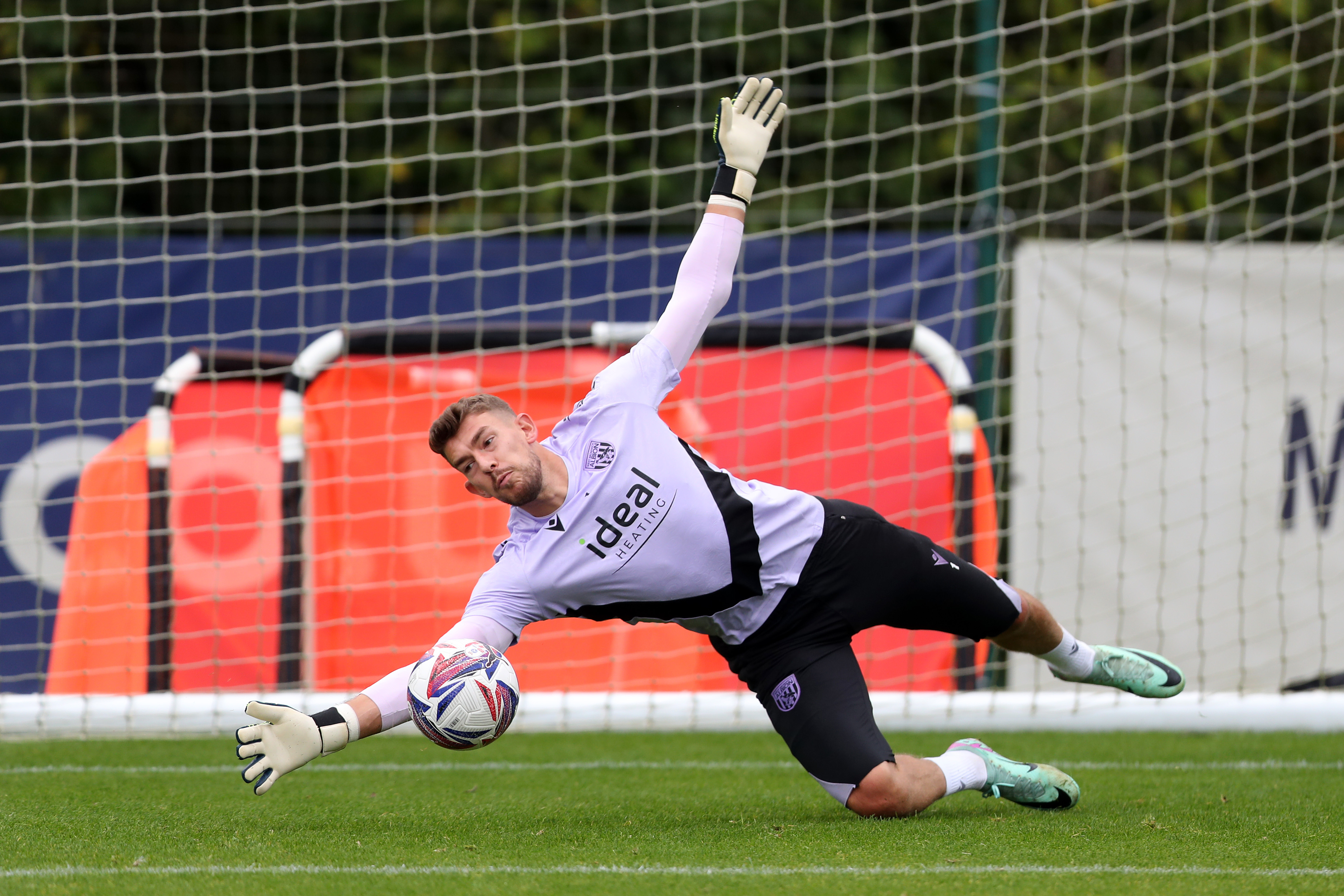 Alex Palmer making a save in training 