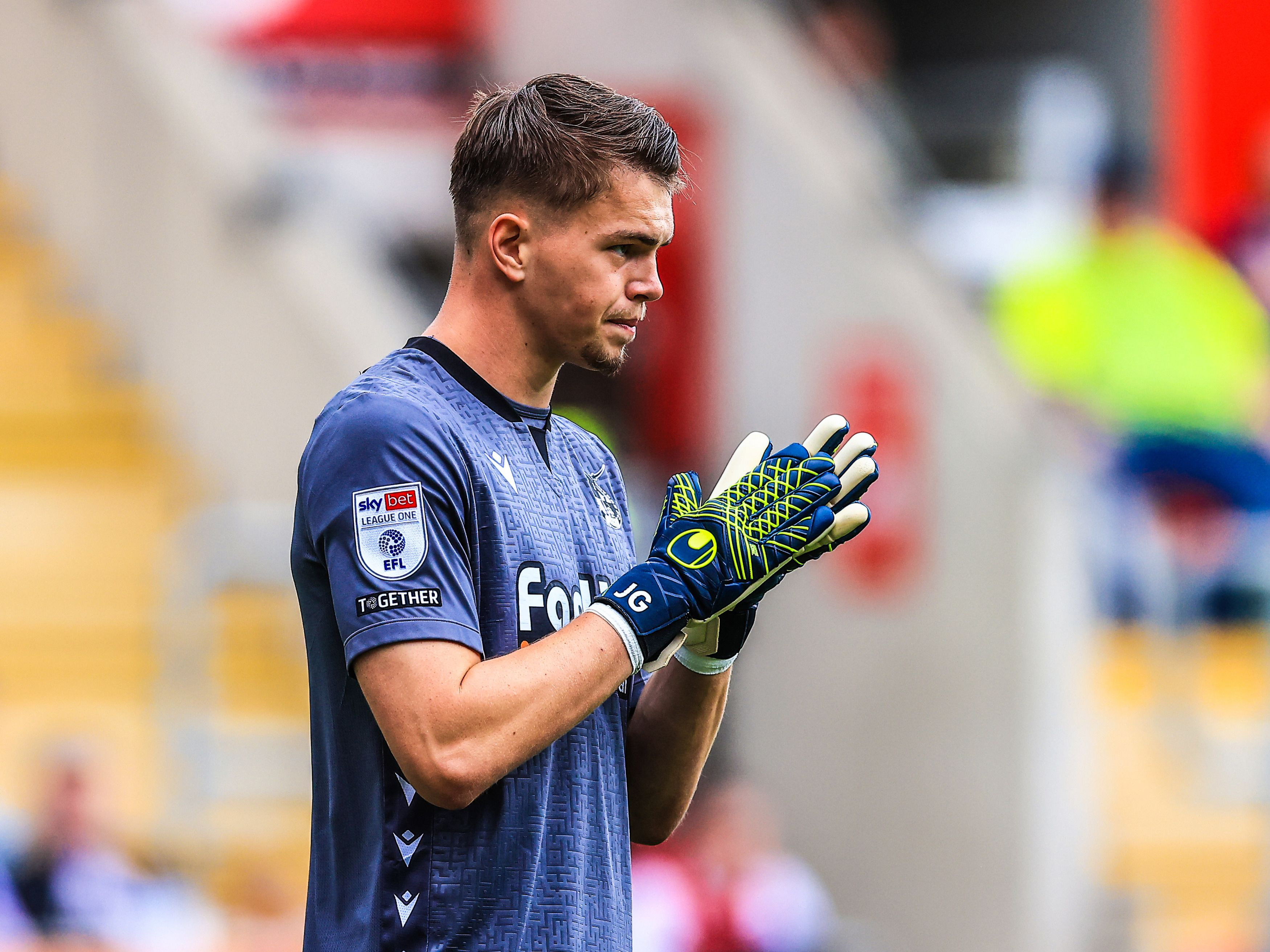 A photo of Albion keeper Josh Griffiths, in loan club Bristol Rovers' kit, looking ahead during a League One match v Rotherham