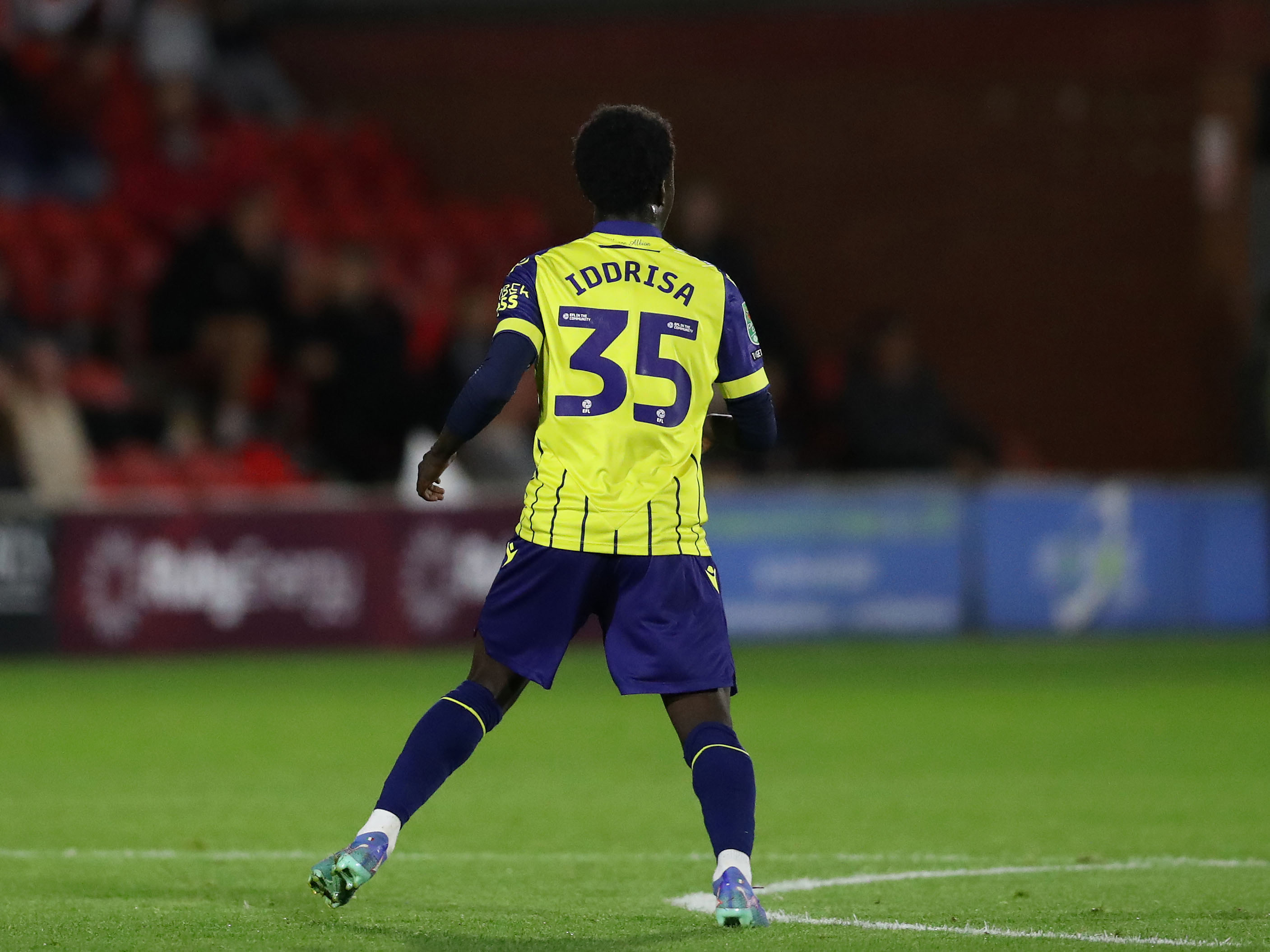 A photo of Albion 18s player Dauda Amihere Iddrisa in the yellow and blue 24/25 away kit