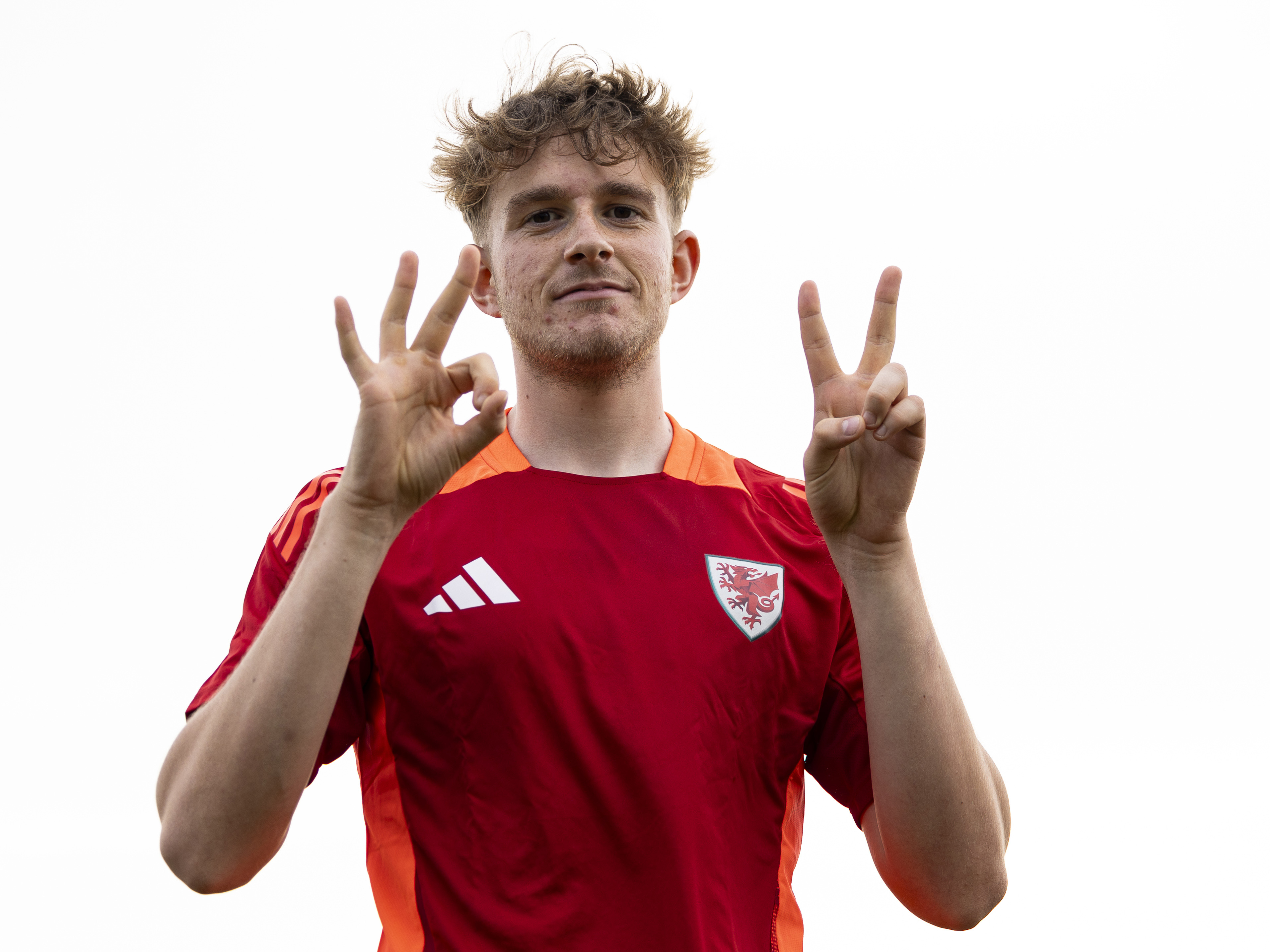 A photo of Albion U18s defender Rhys Morrish in a Wales training top