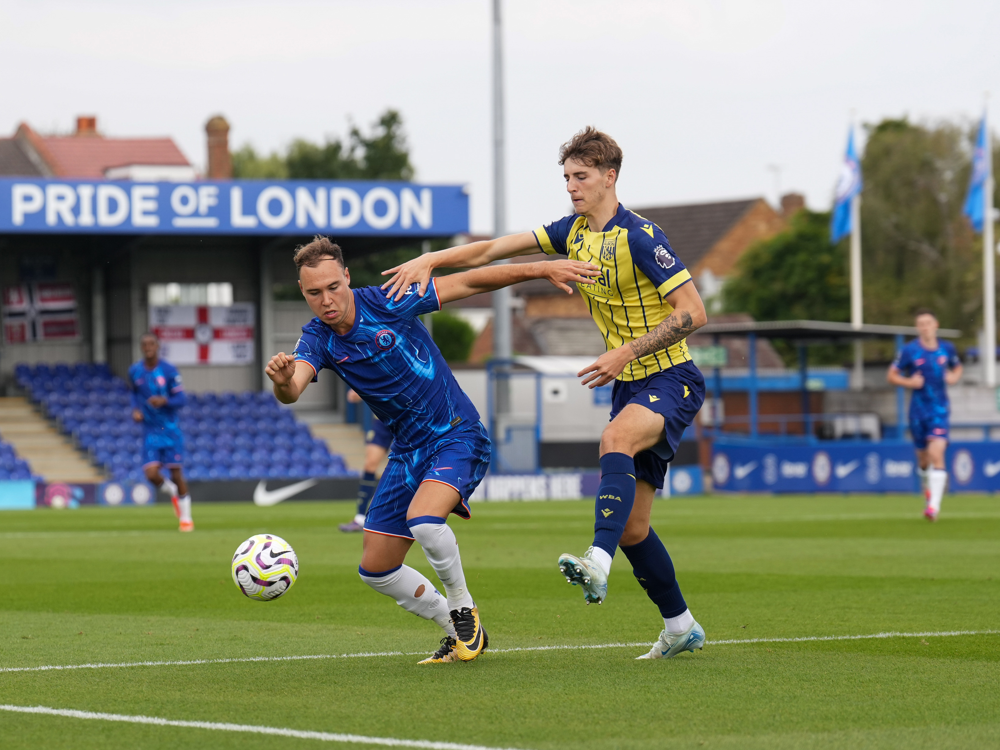 A photo of Albion U21s defender Josh Shaw in the 2024.25 yellow and blue away kit playing v Chelsea