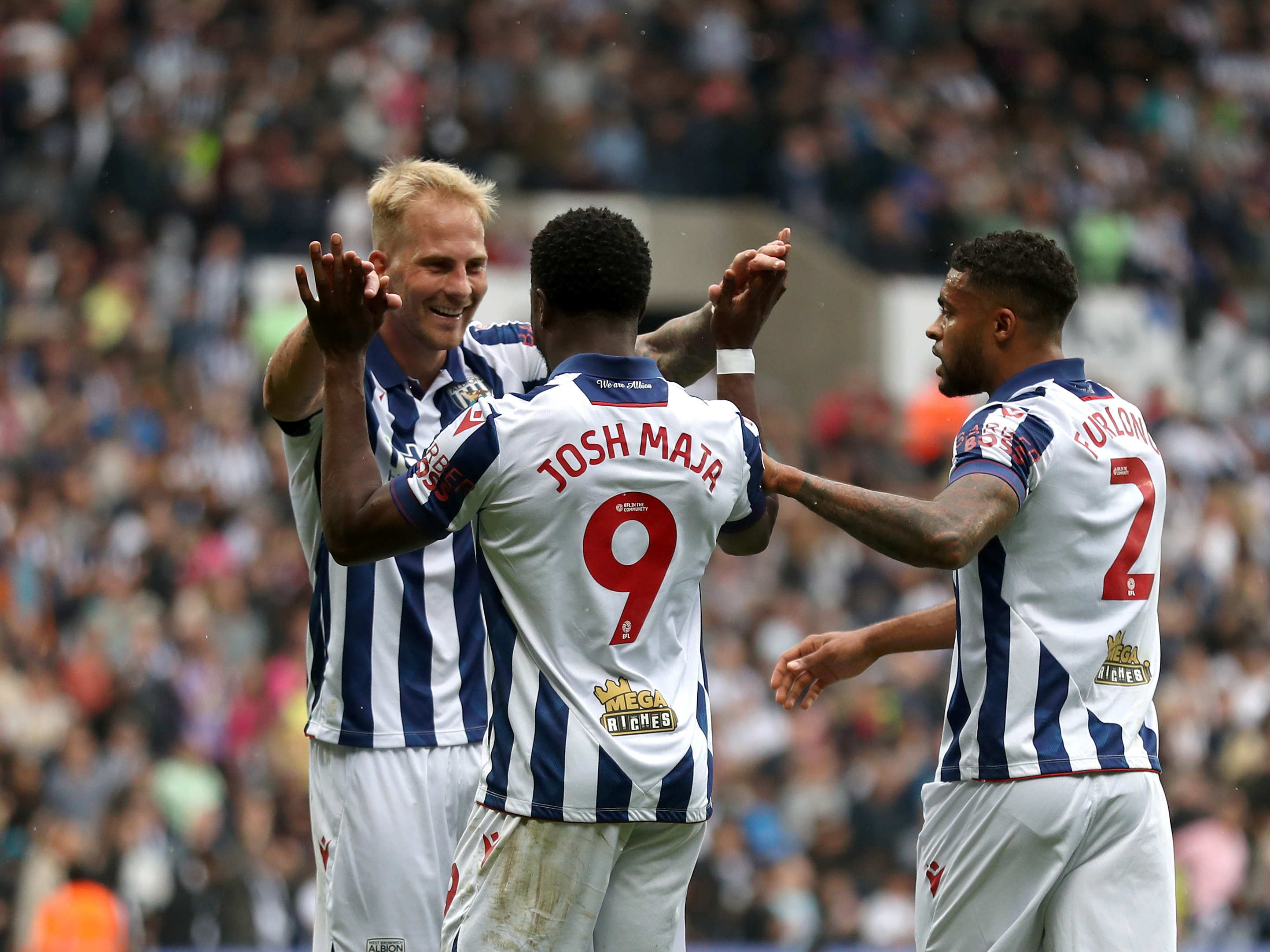 An image of Josh Maja, Uros Racic and Darnell Furlong celebrating a goal against Plymouth