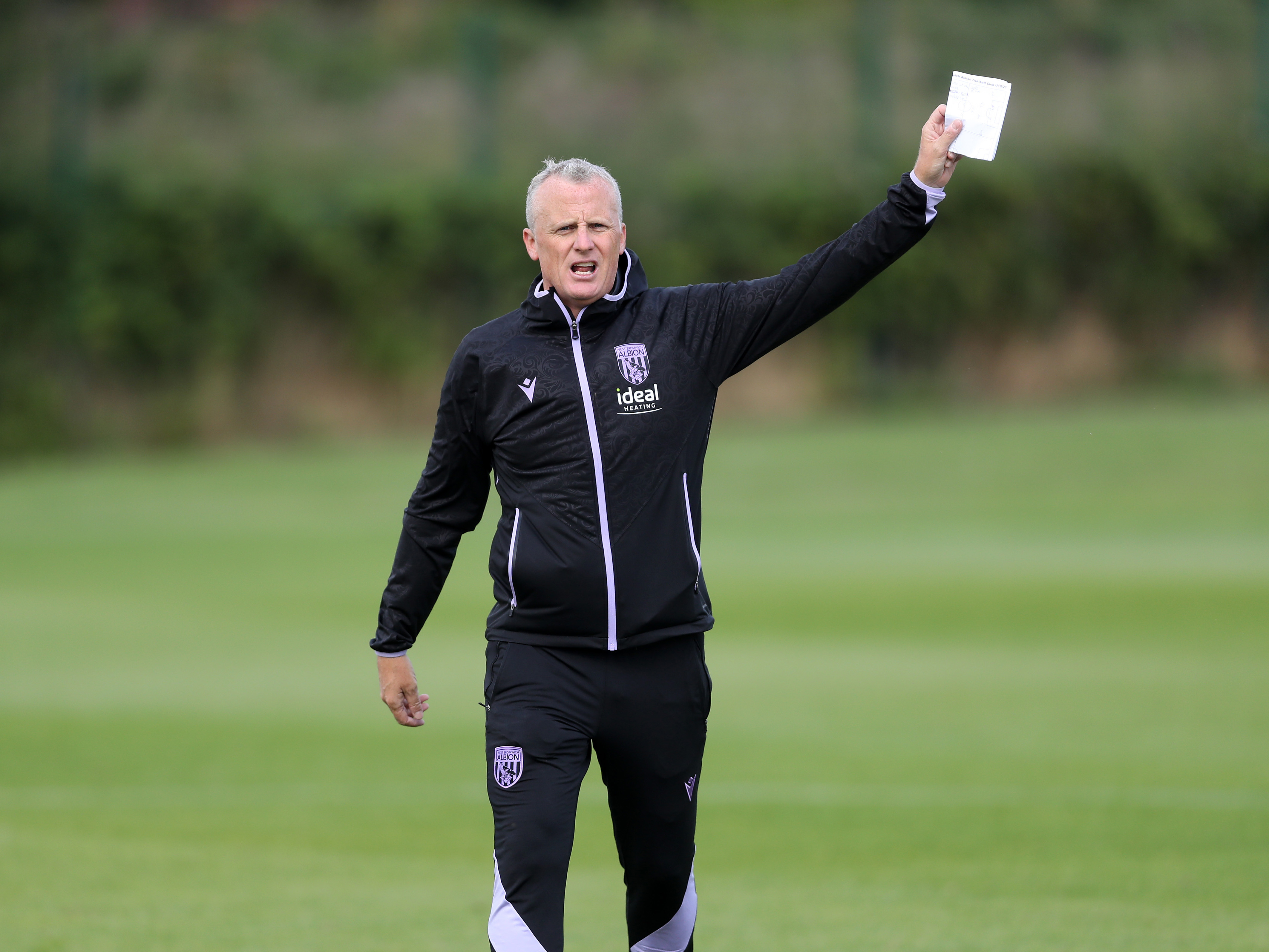 A photo of Albion U21s boss Richard Beale overseeing training at the club's training ground