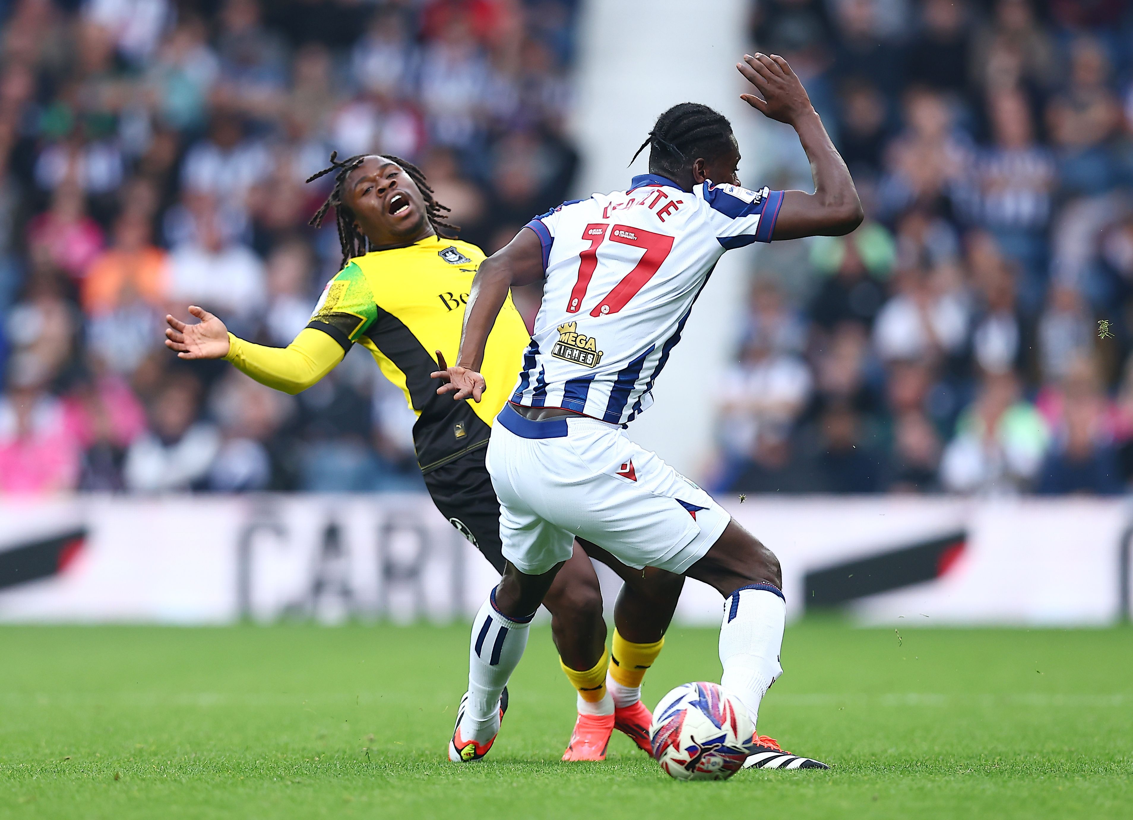 Ousmane Diakité challenges a Plymouth player 