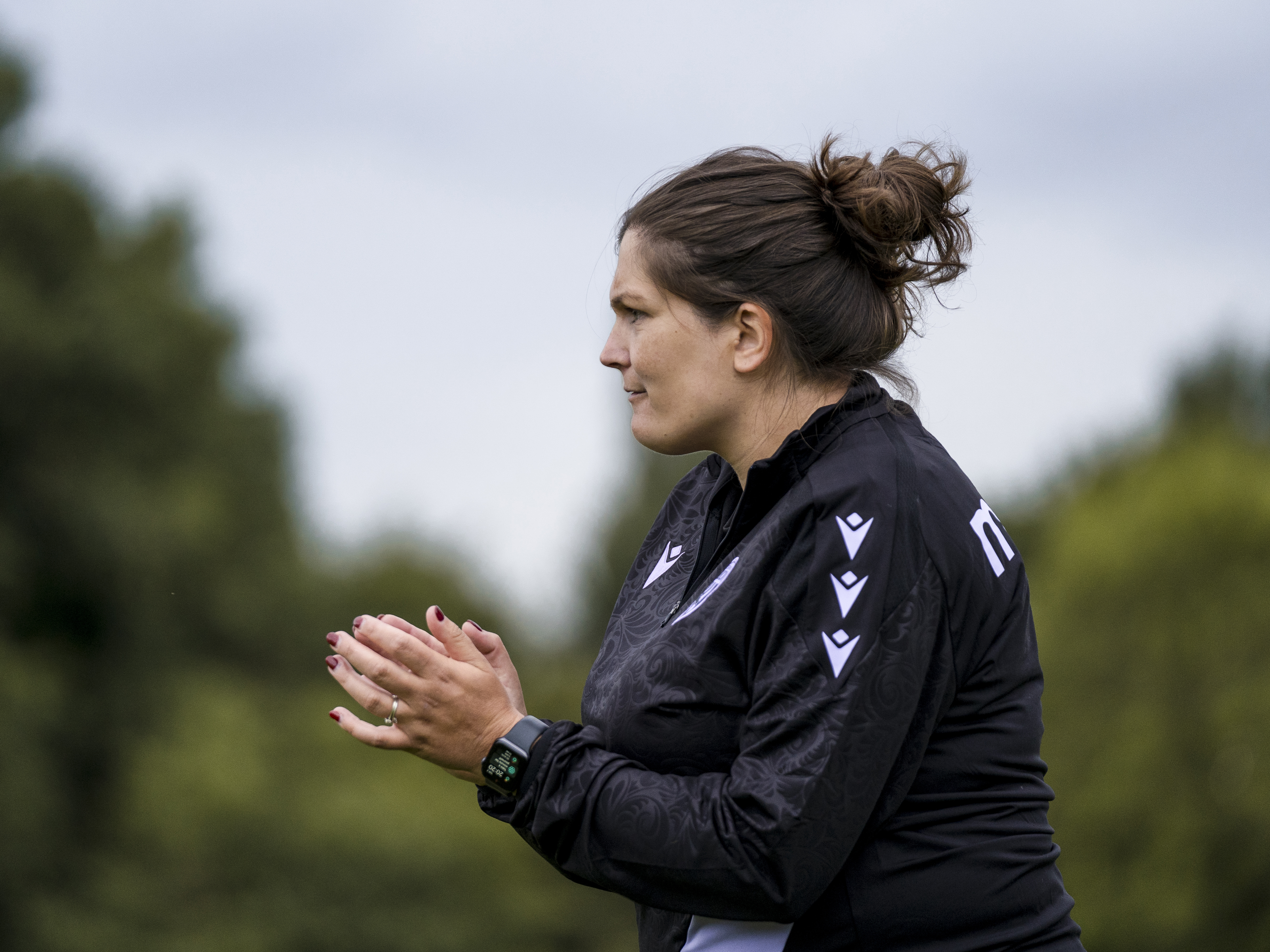 An image of Siobhan Hodgetts-Still applauding her team