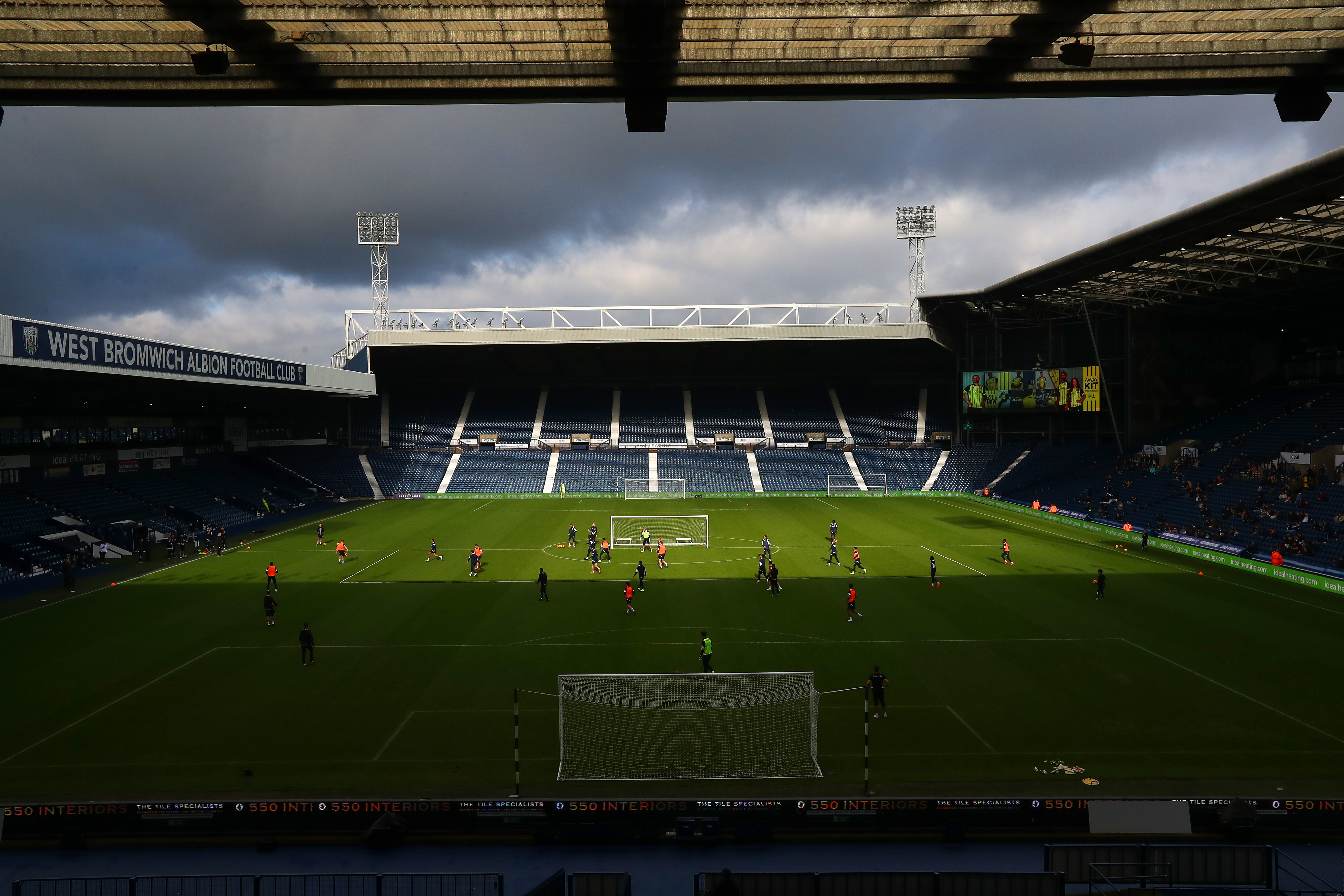 A wide view of The Hawthorns while Albion train