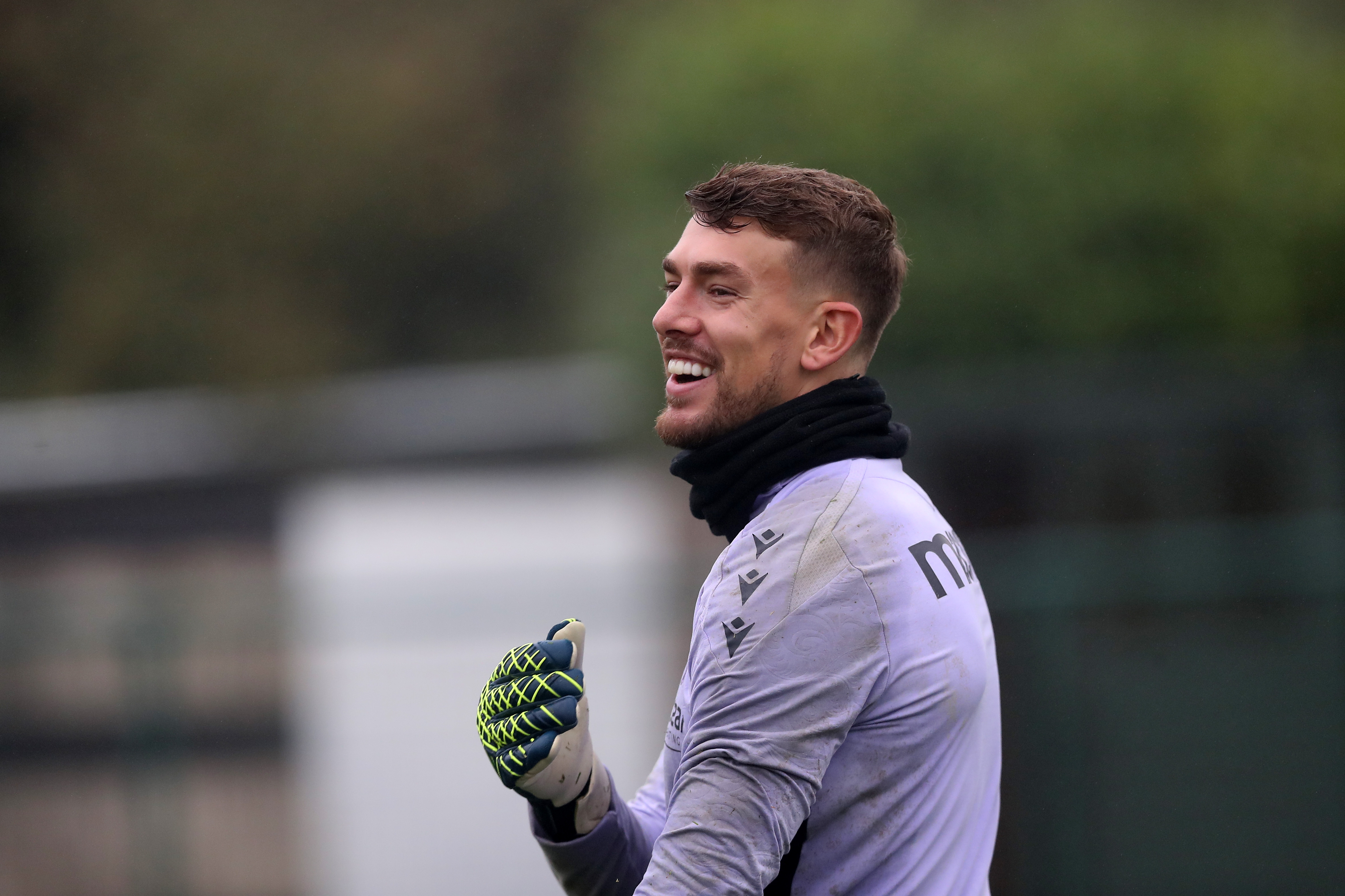 Alex Palmer laughing during a training session 