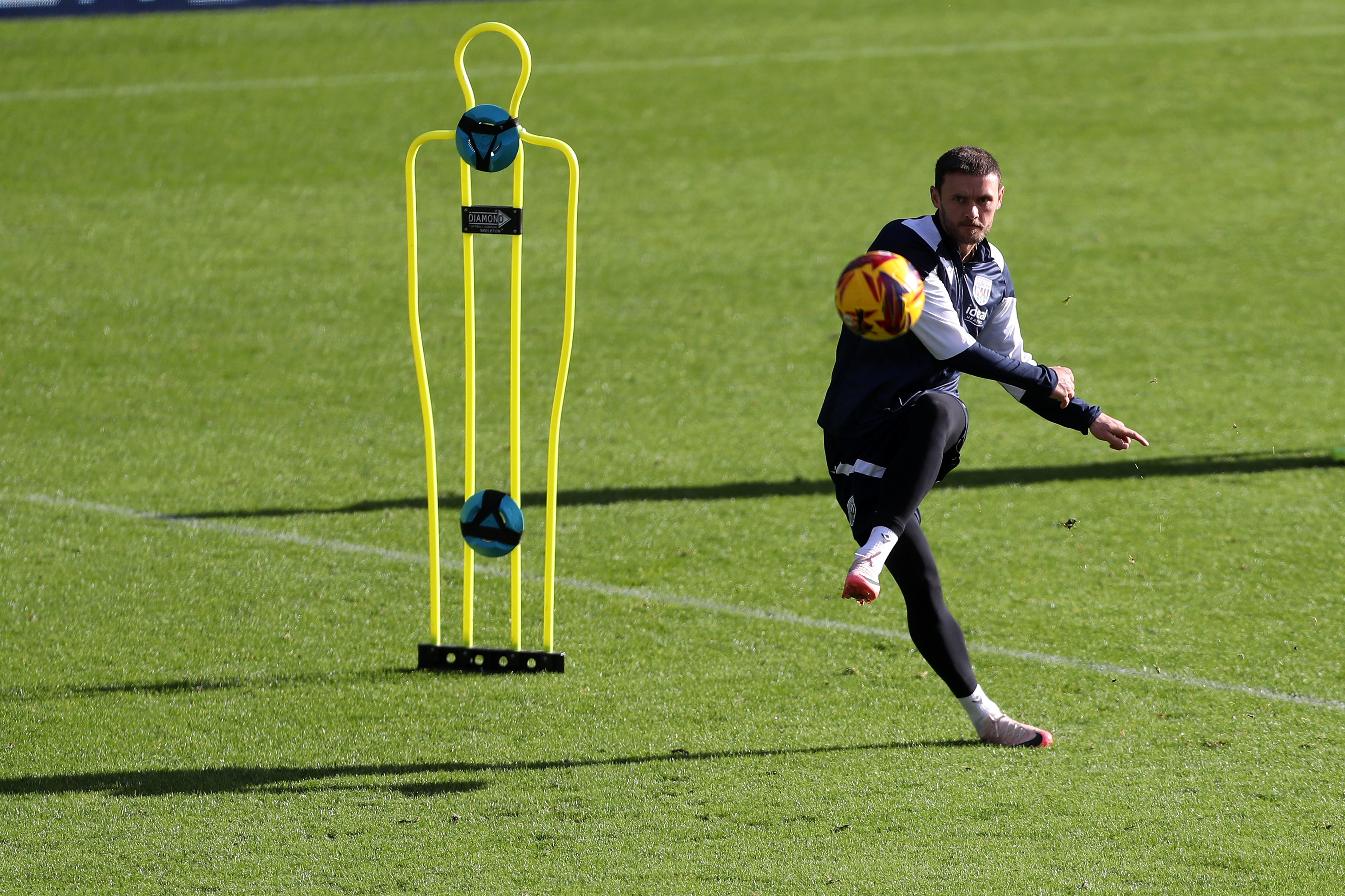 John Swift shooting at goal during a training session at The Hawthorns