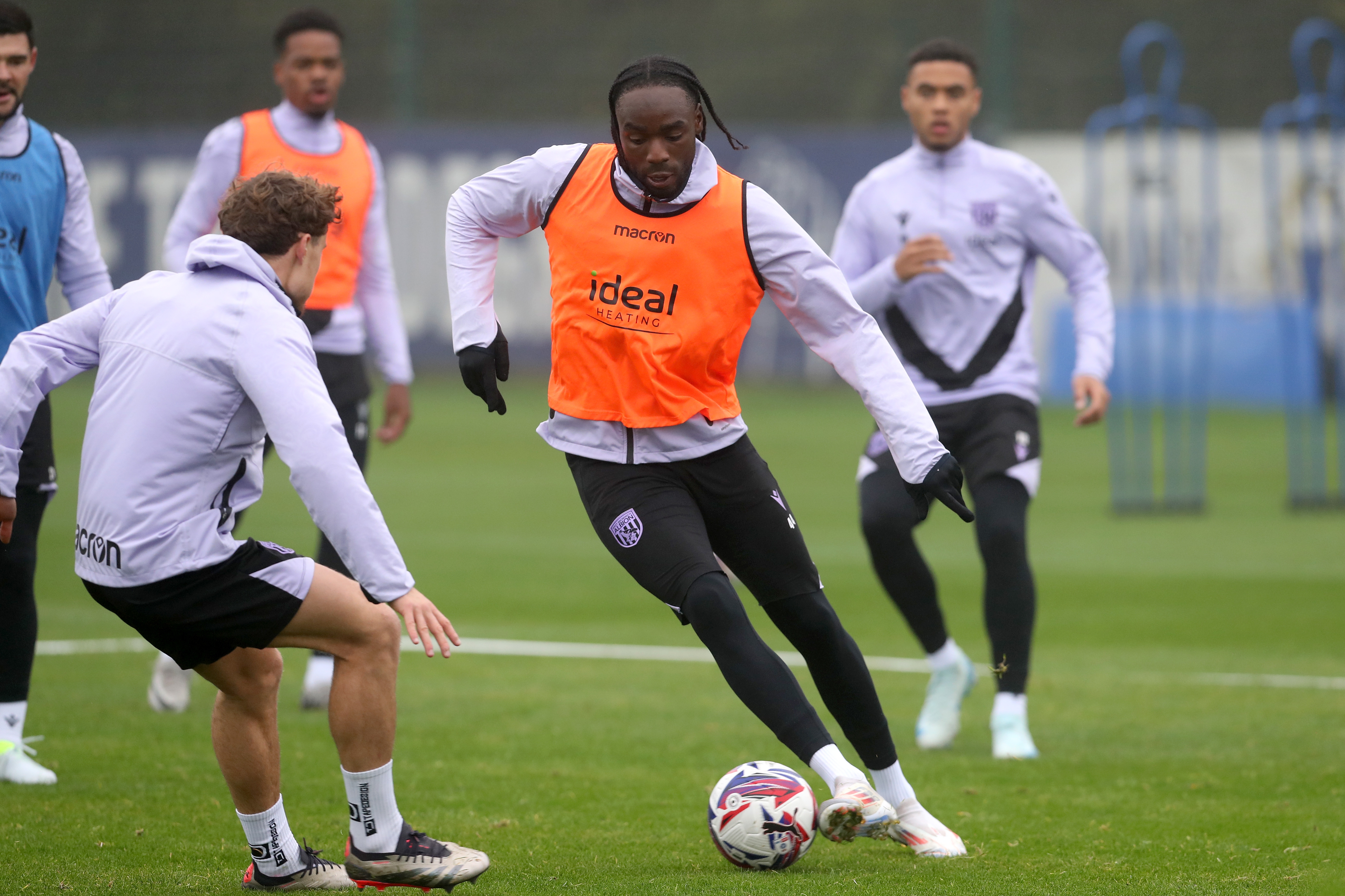 Devante Cole running with the ball during a training session 