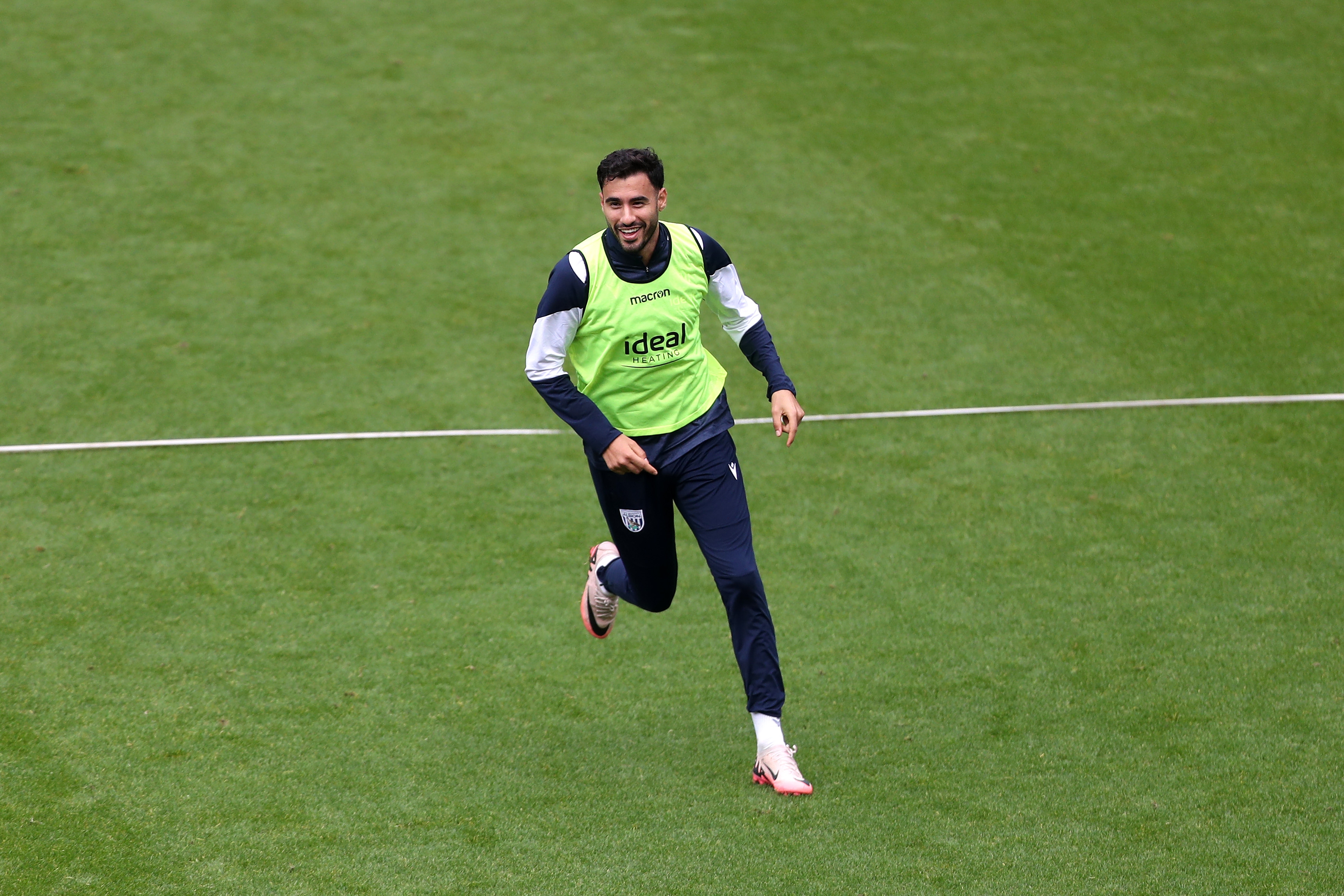 Gianluca Frabotta running forward during a training session at The Hawthorns