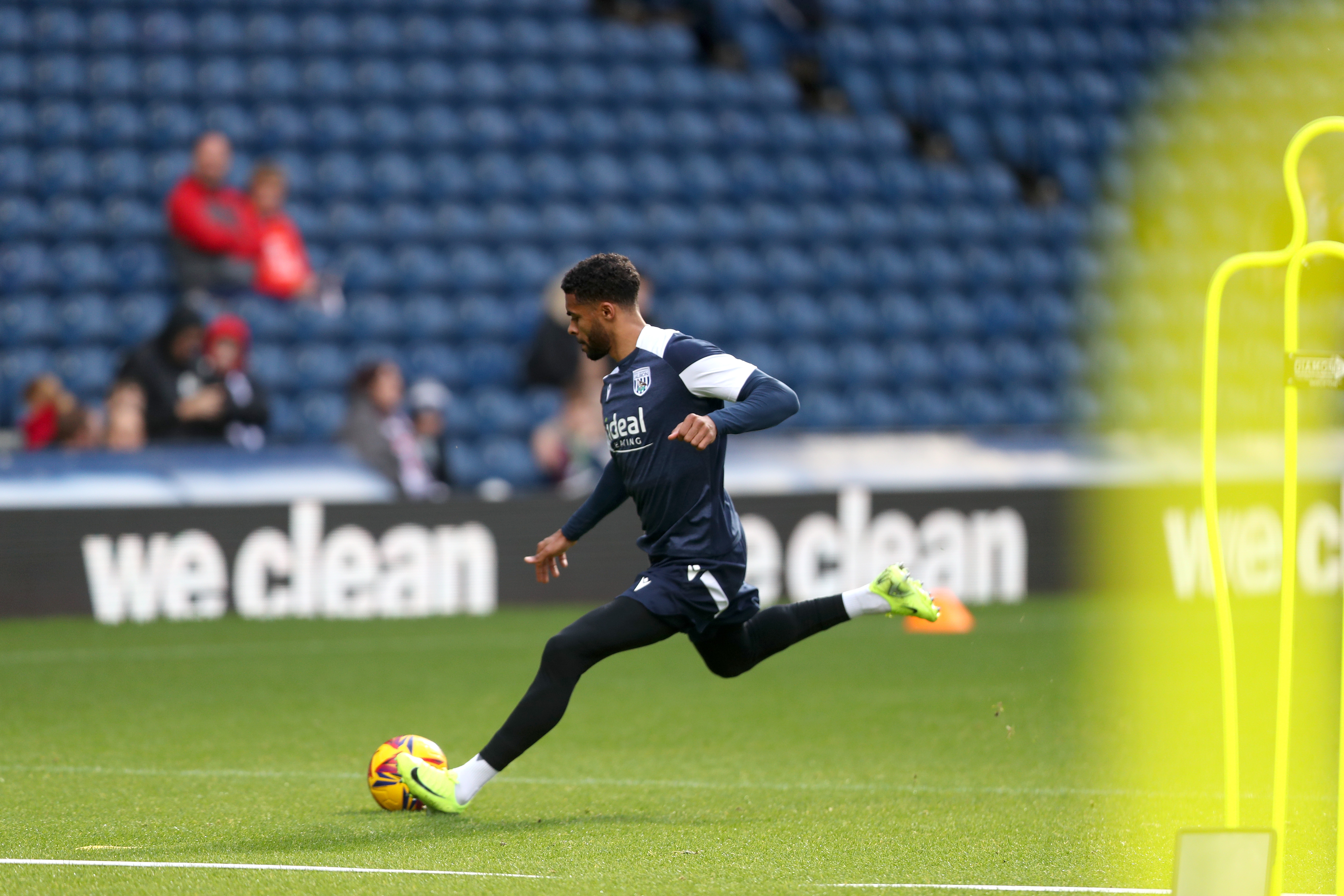 Darnell Furlong striking the ball during a training session at The Hawthorns