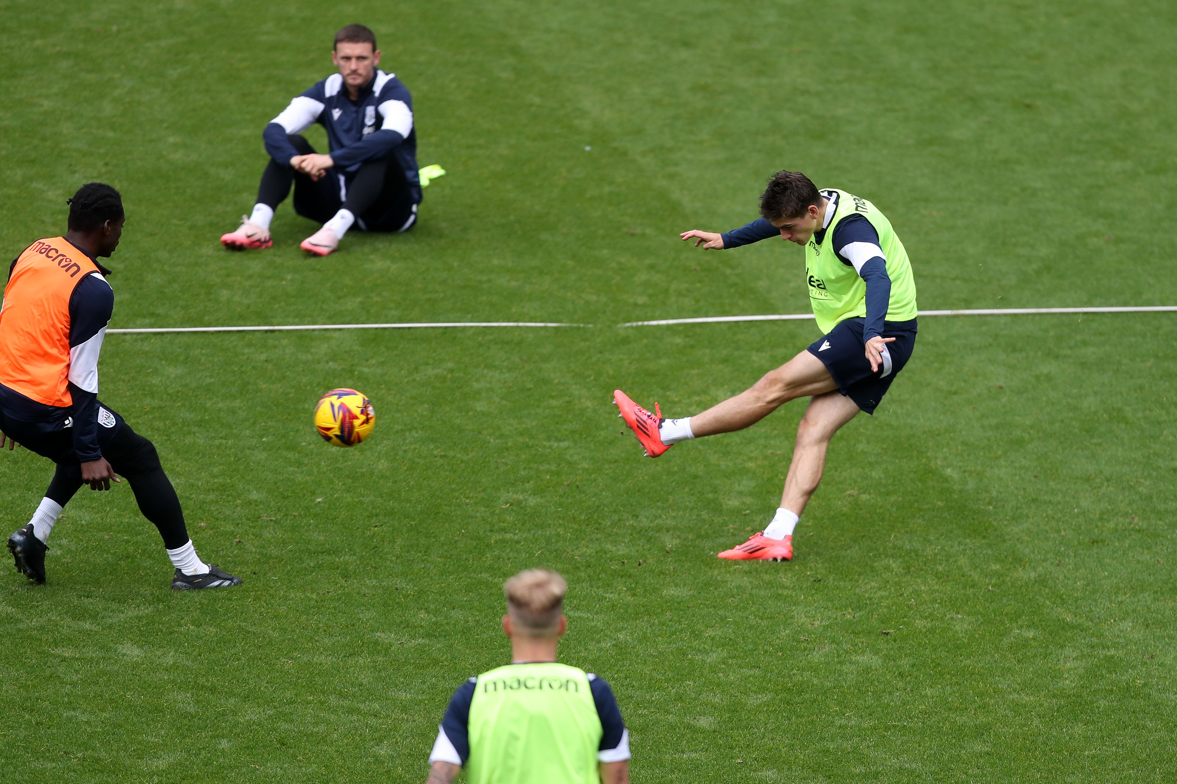 Tom Fellows striking the ball during a training session at The Hawthorns