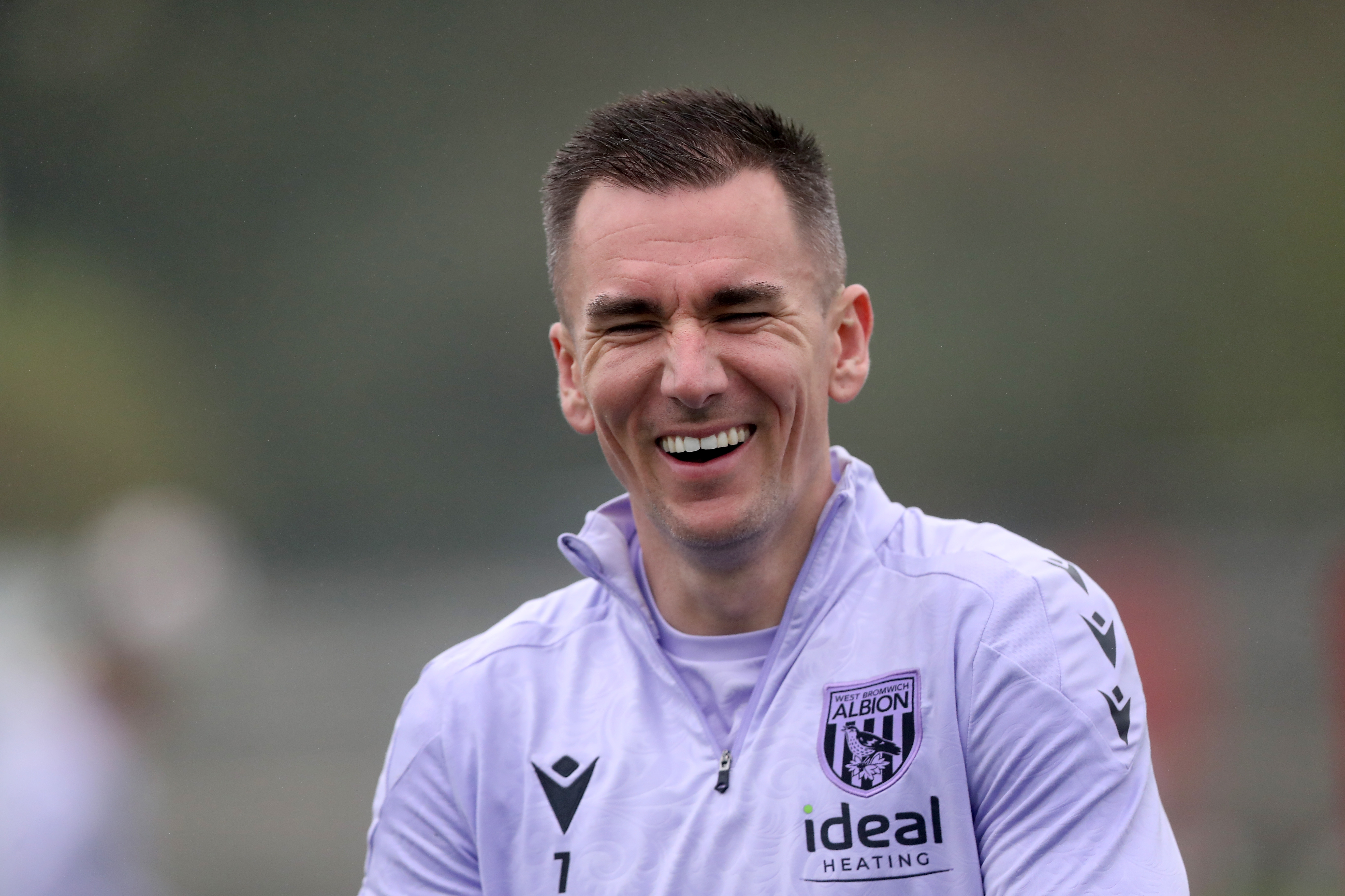 Jed Wallace laughing during a training session 