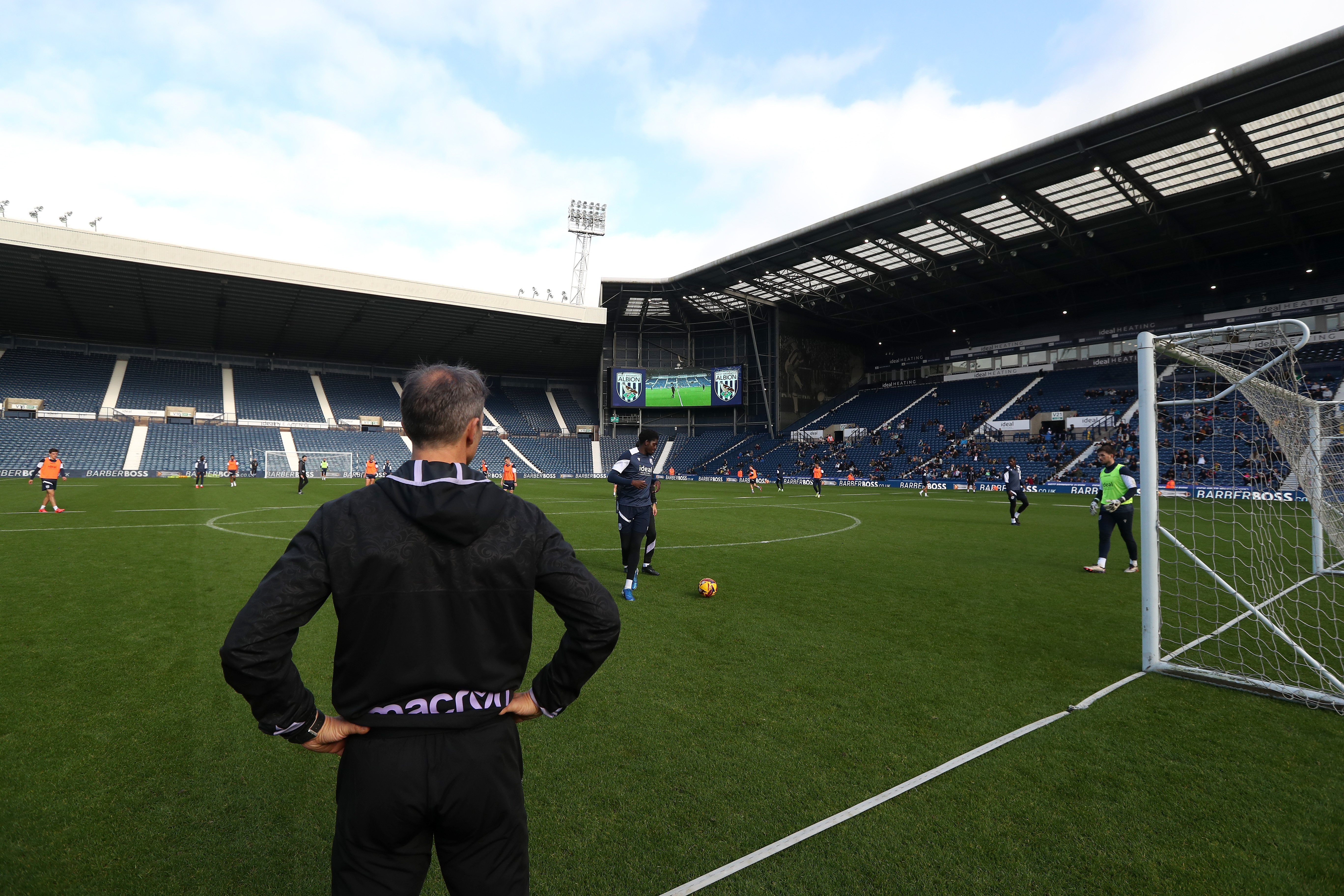 A wide view of The Hawthorns while Albion train