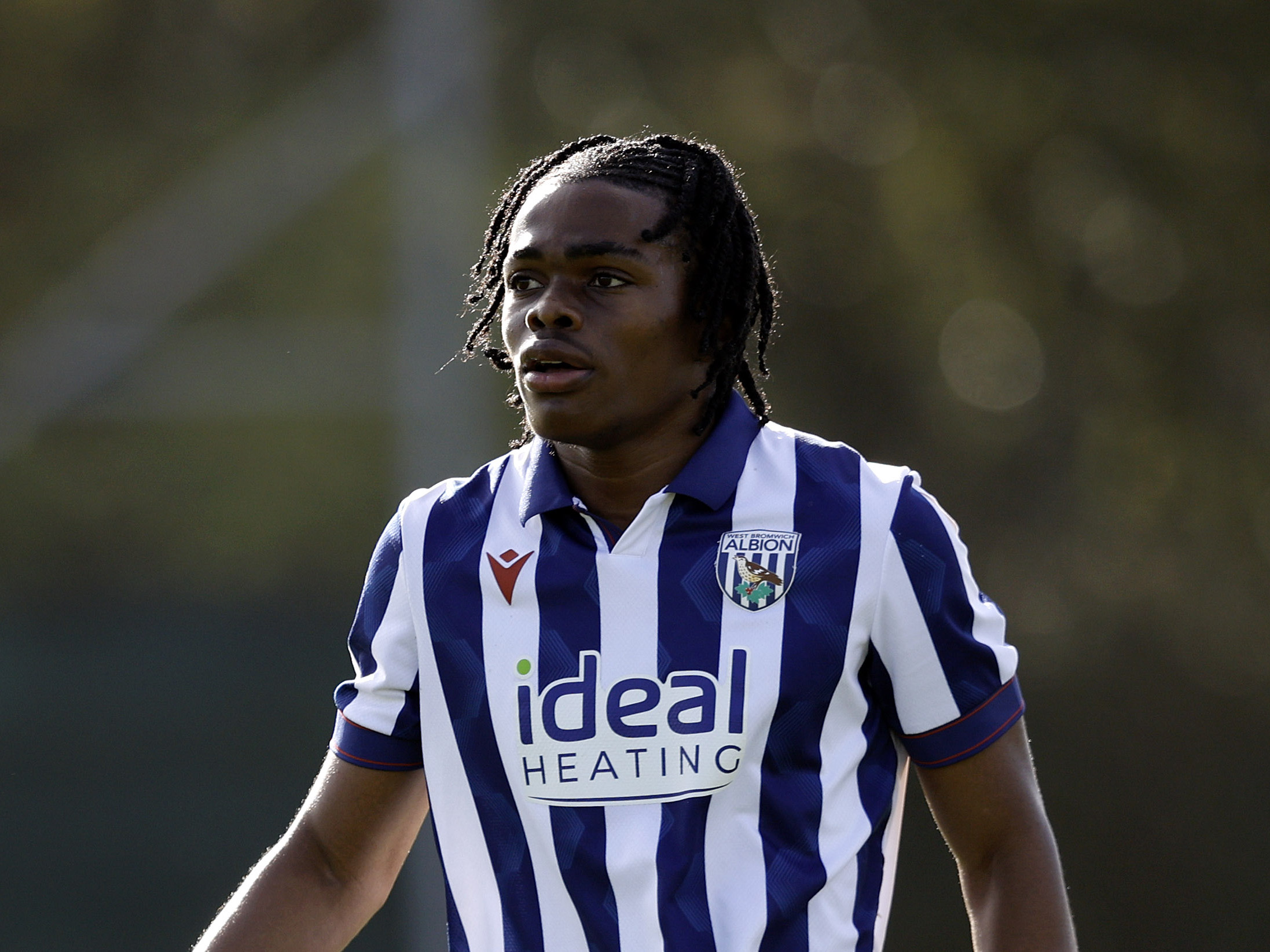 A photo of Albion u18s attacker Divine Onyemachi in the 2024/25 home kit