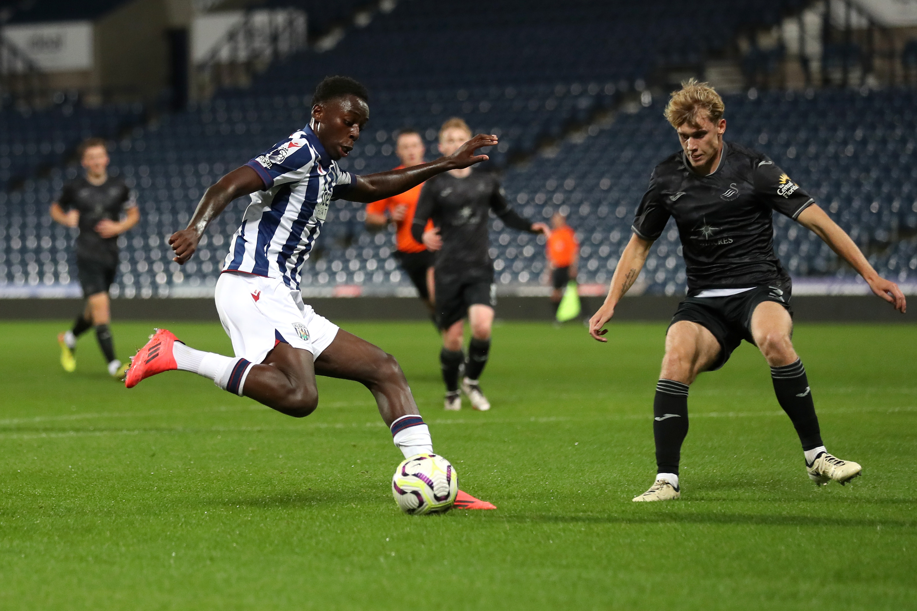 Eseosa Sule in action for Albion in the PL Cup against Swansea in the home kit 