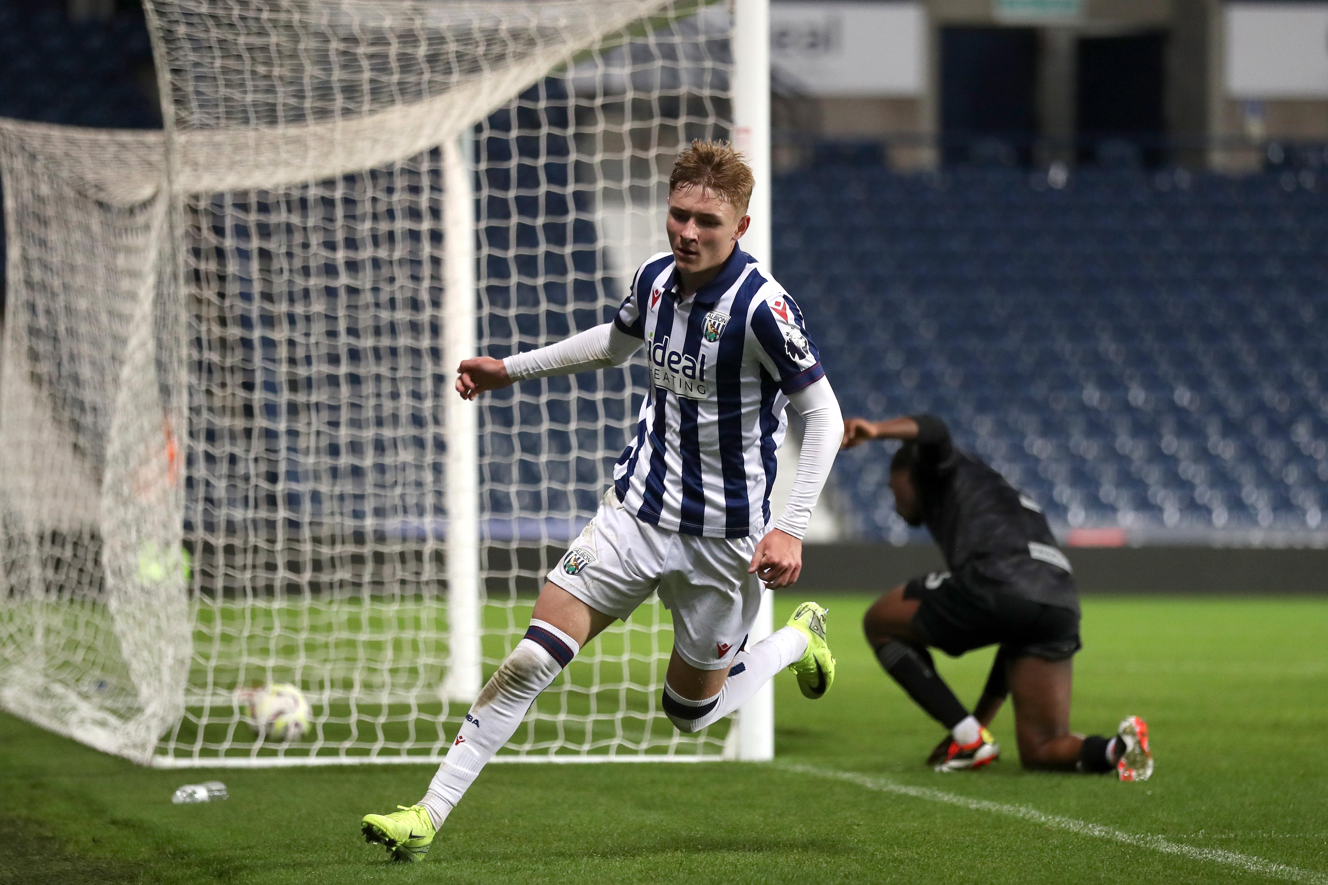 Ollie Bostock celebrates scoring against Swansea at The Hawthorns in the PL Cup 