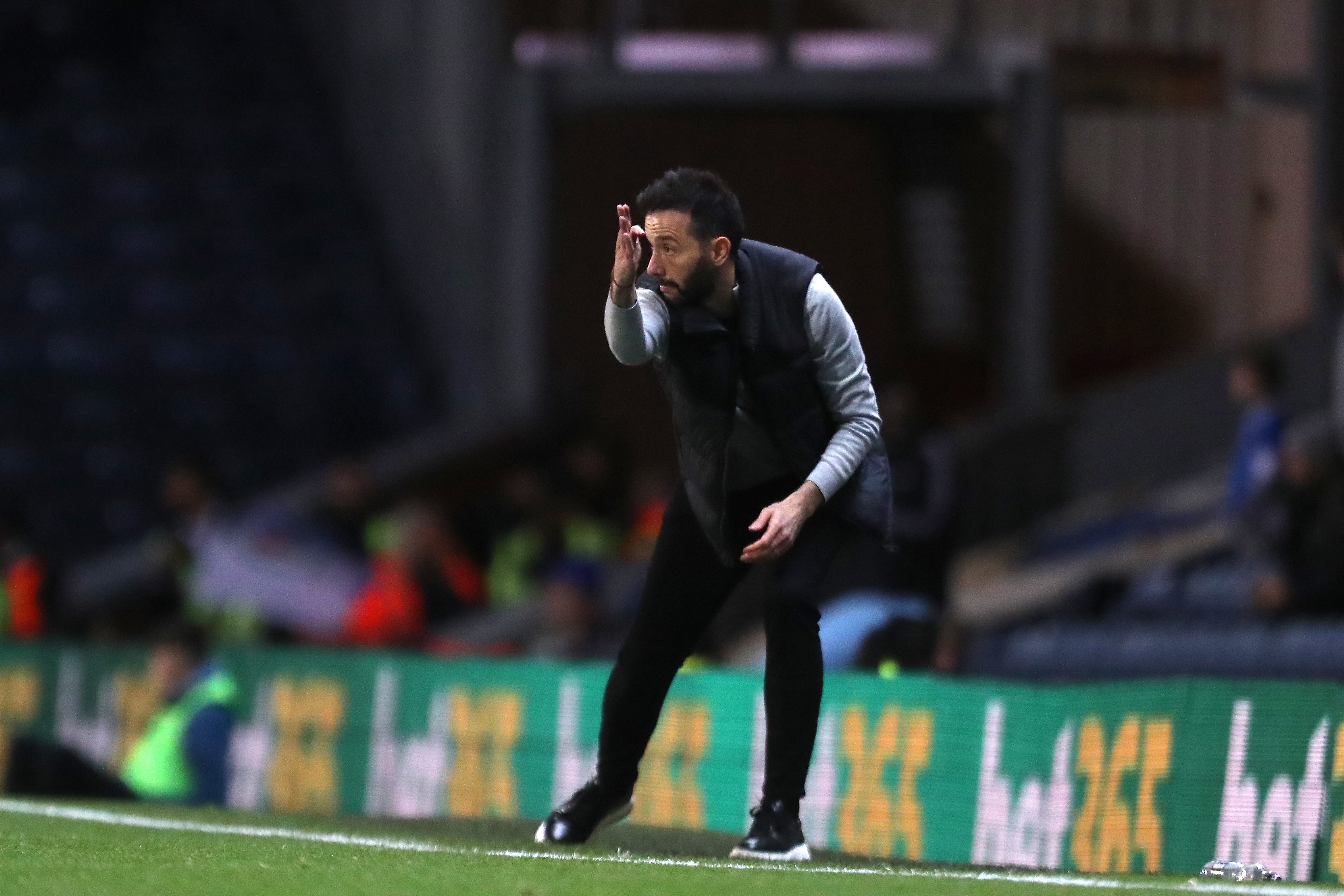 Carlos Corberán delivering instructions to his players on the side of the pitch at Blackburn 