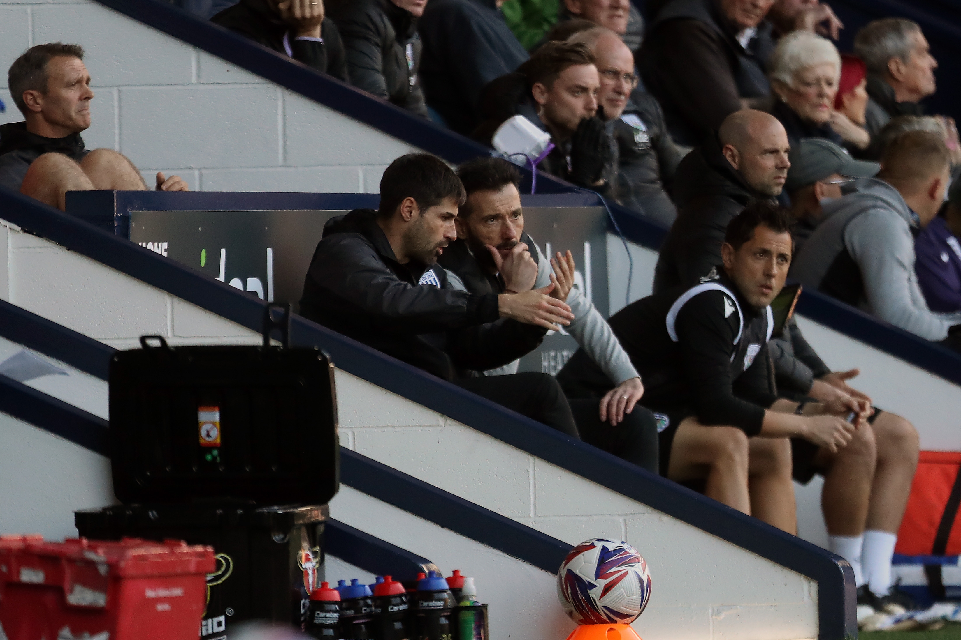 Carlos Corberán on the bench at The Hawthorns with assistant coach Jorge Alarcon against Cardiff City  