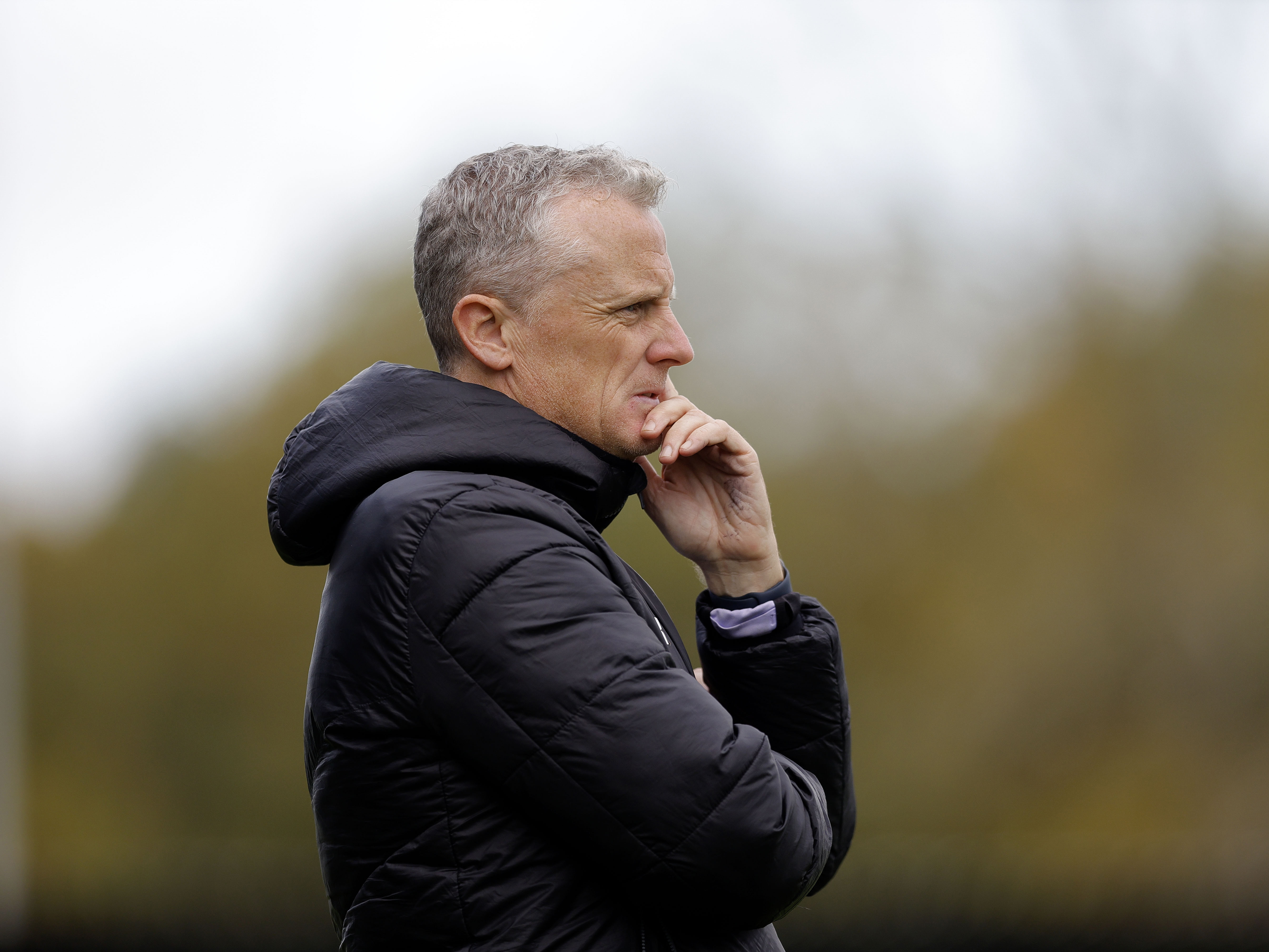 A photo of Albion u21s boss Richard Beale overseeing a PL2 match at Solihull Moors' Damson Park stadium