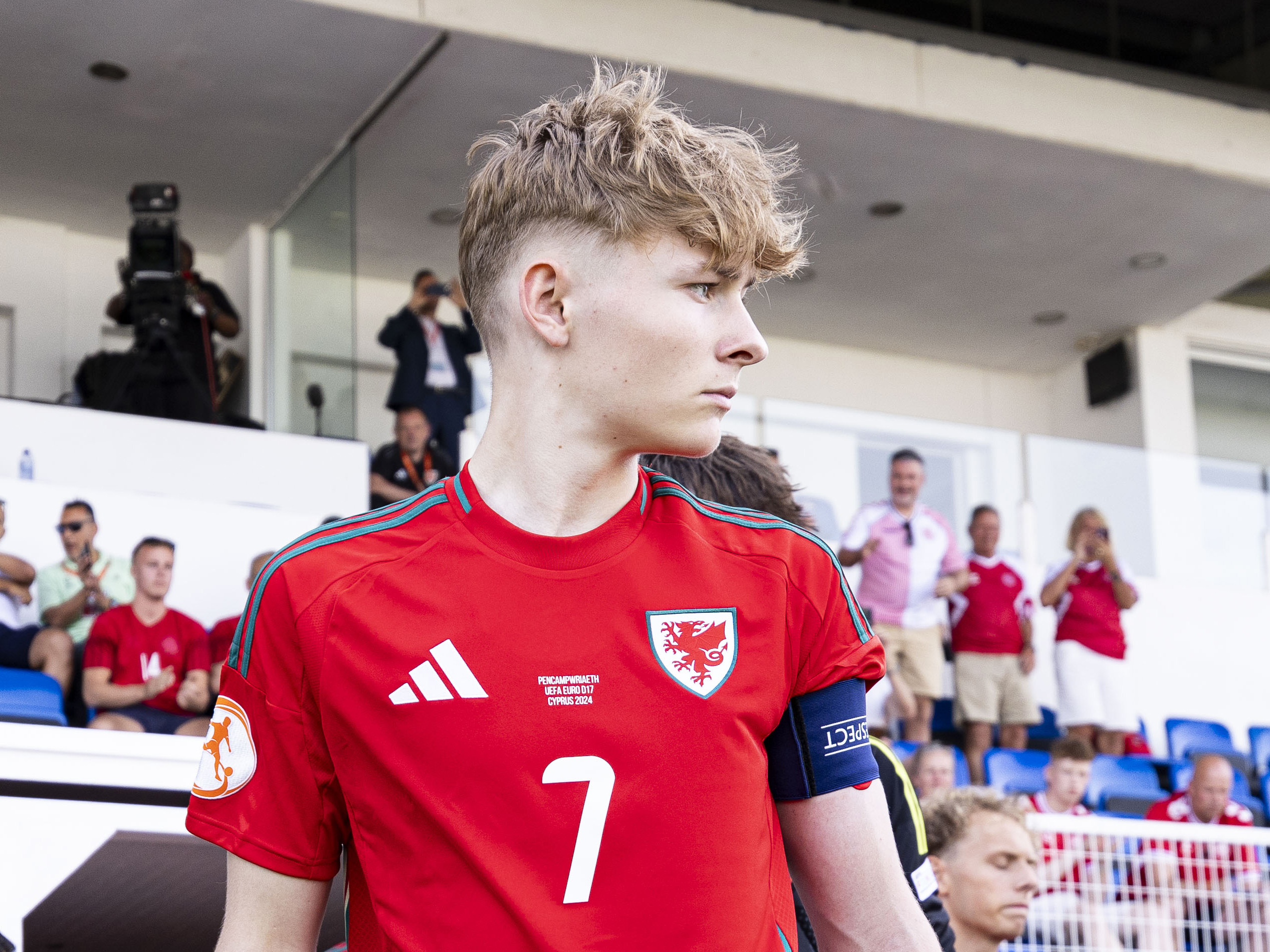 A photo of Albion youngster Ollie Bostock in action for Wales