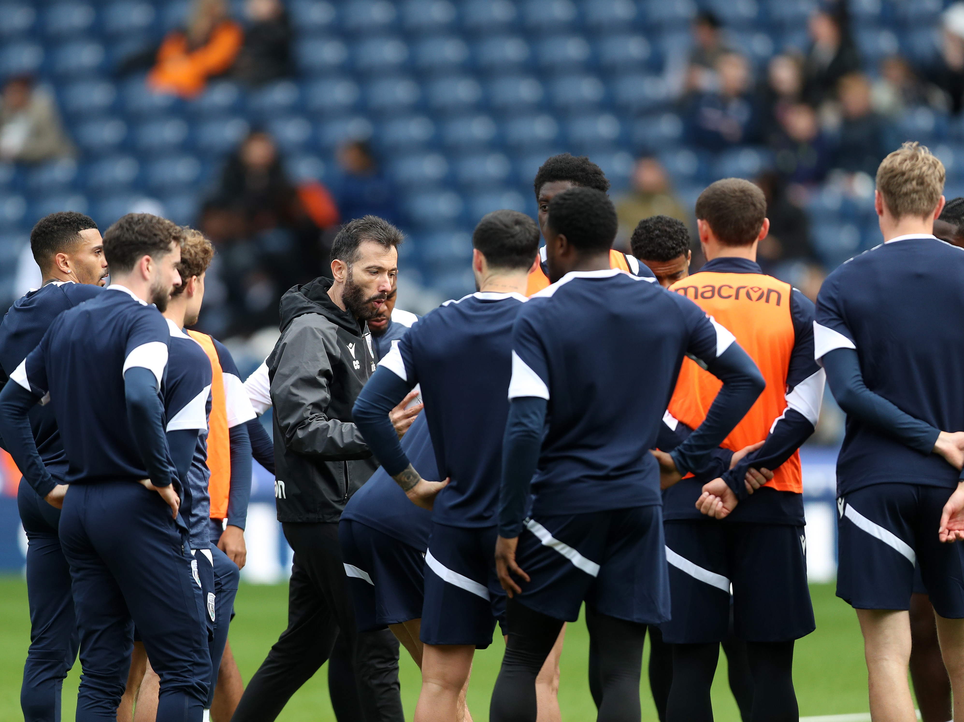 Carlos Corberán delivers instructions to his players during a session at The Hawthorns 