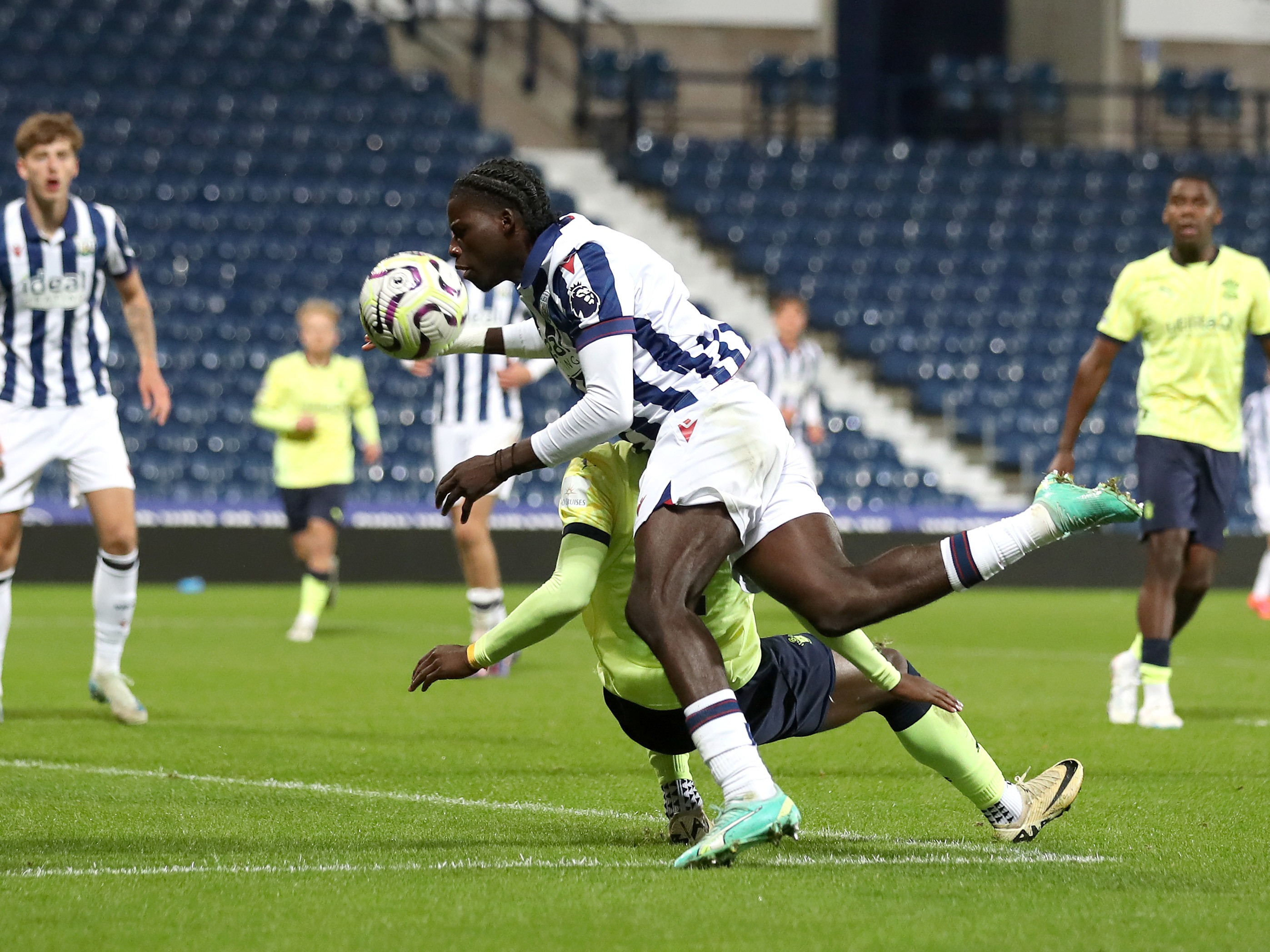 A photo of Albion U21s defender Mo Diomande in the 2024/25 home kit