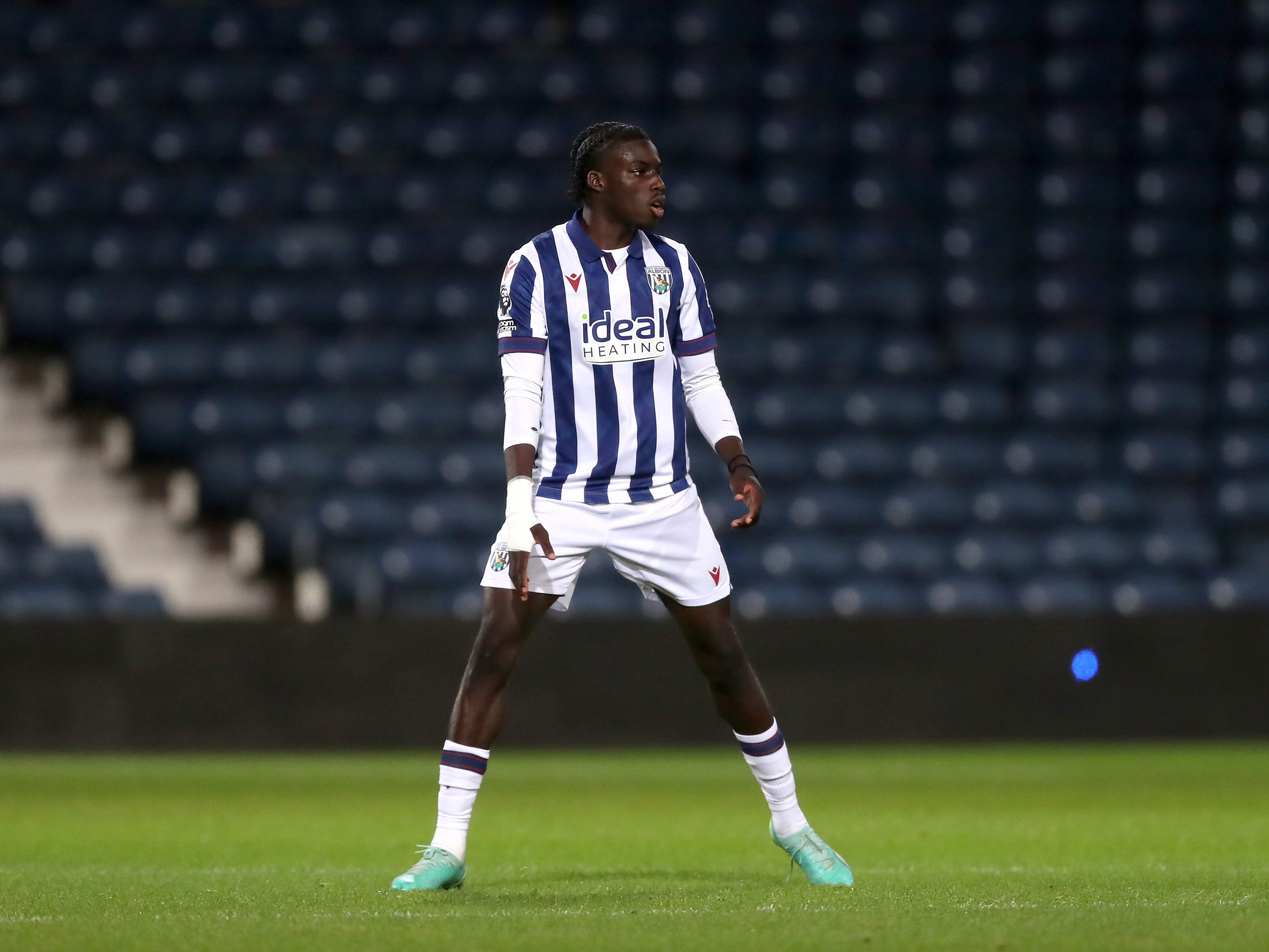 A photo of Albion u21s defender Mo Diomande in the 2024/25 home kit