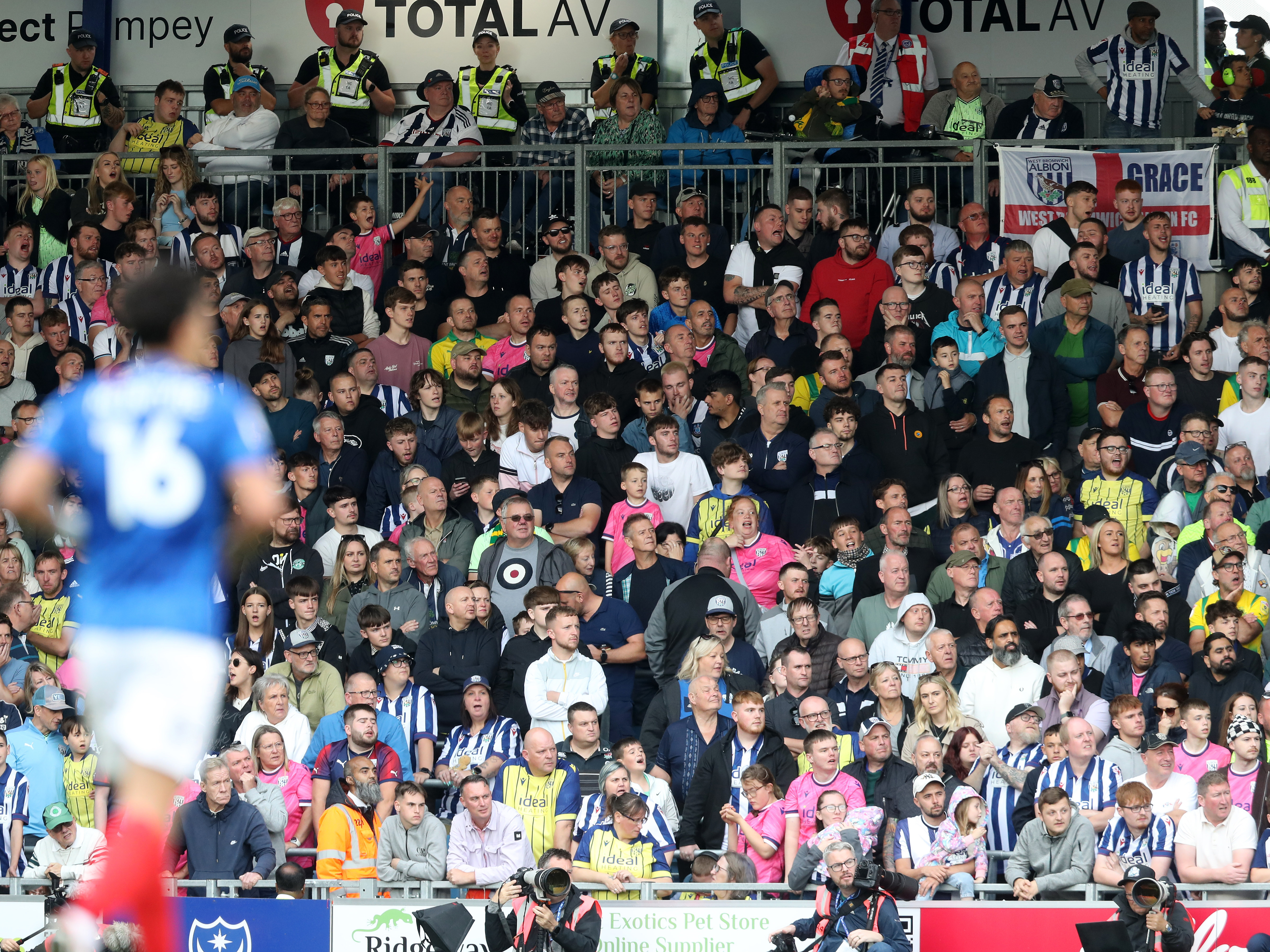 A photo of Albion fans in the away end at Pompey