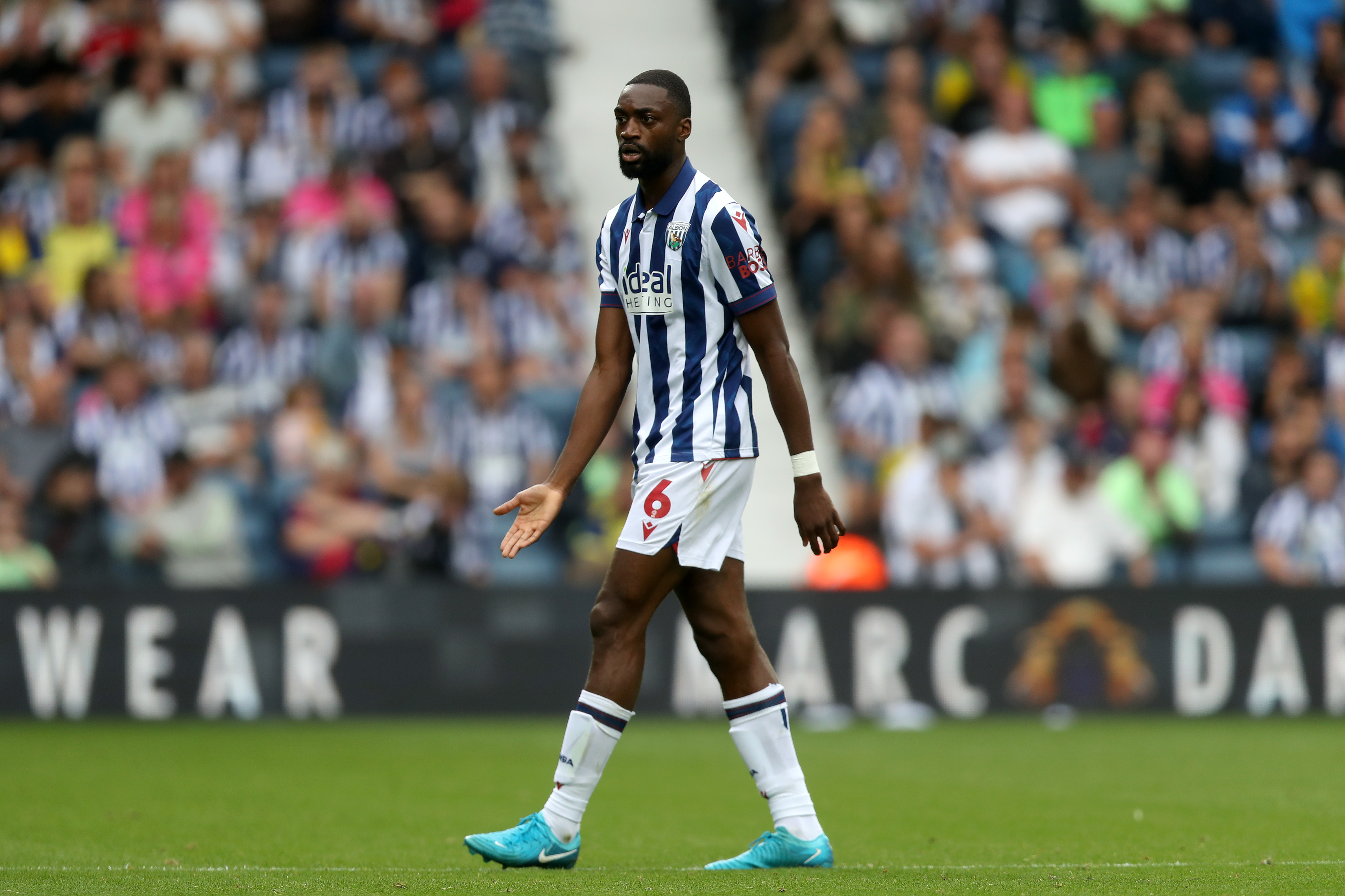 Semi Ajayi in Albion's home shirt in a match at The Hawthorns