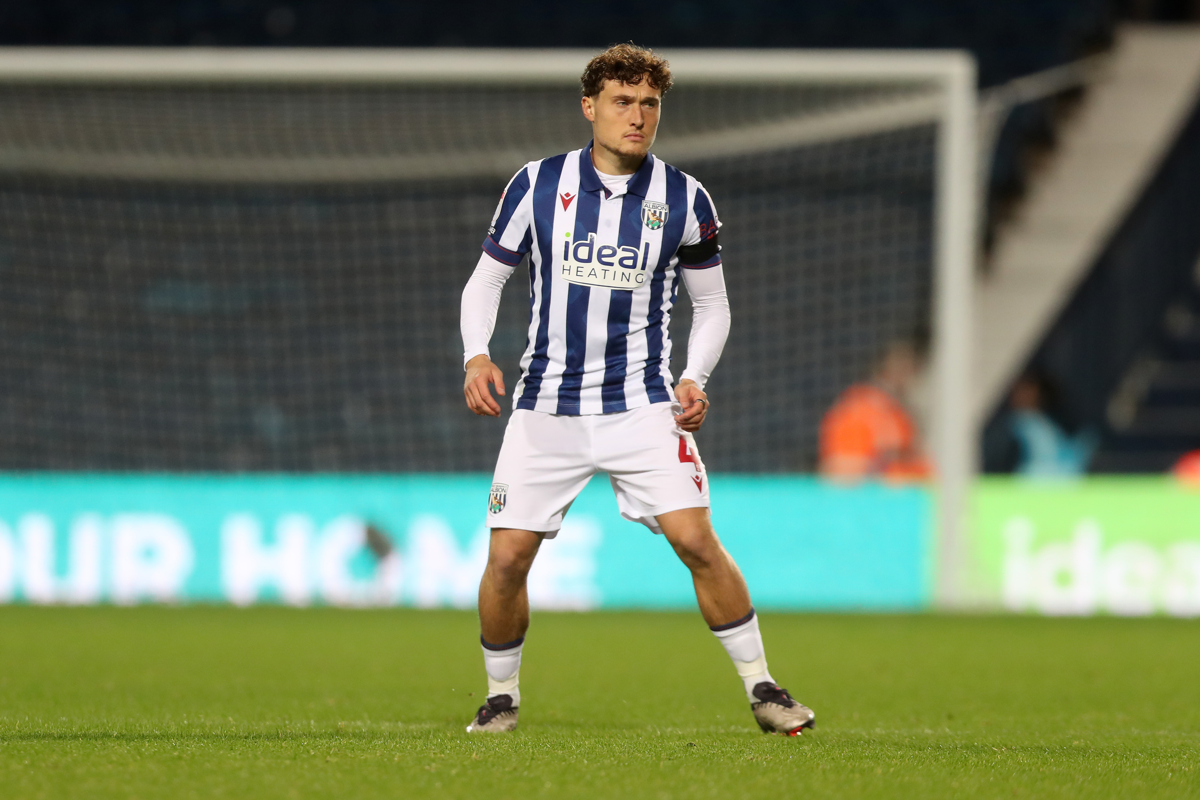 Callum Styles in action for Albion at The Hawthorns in the home kit 