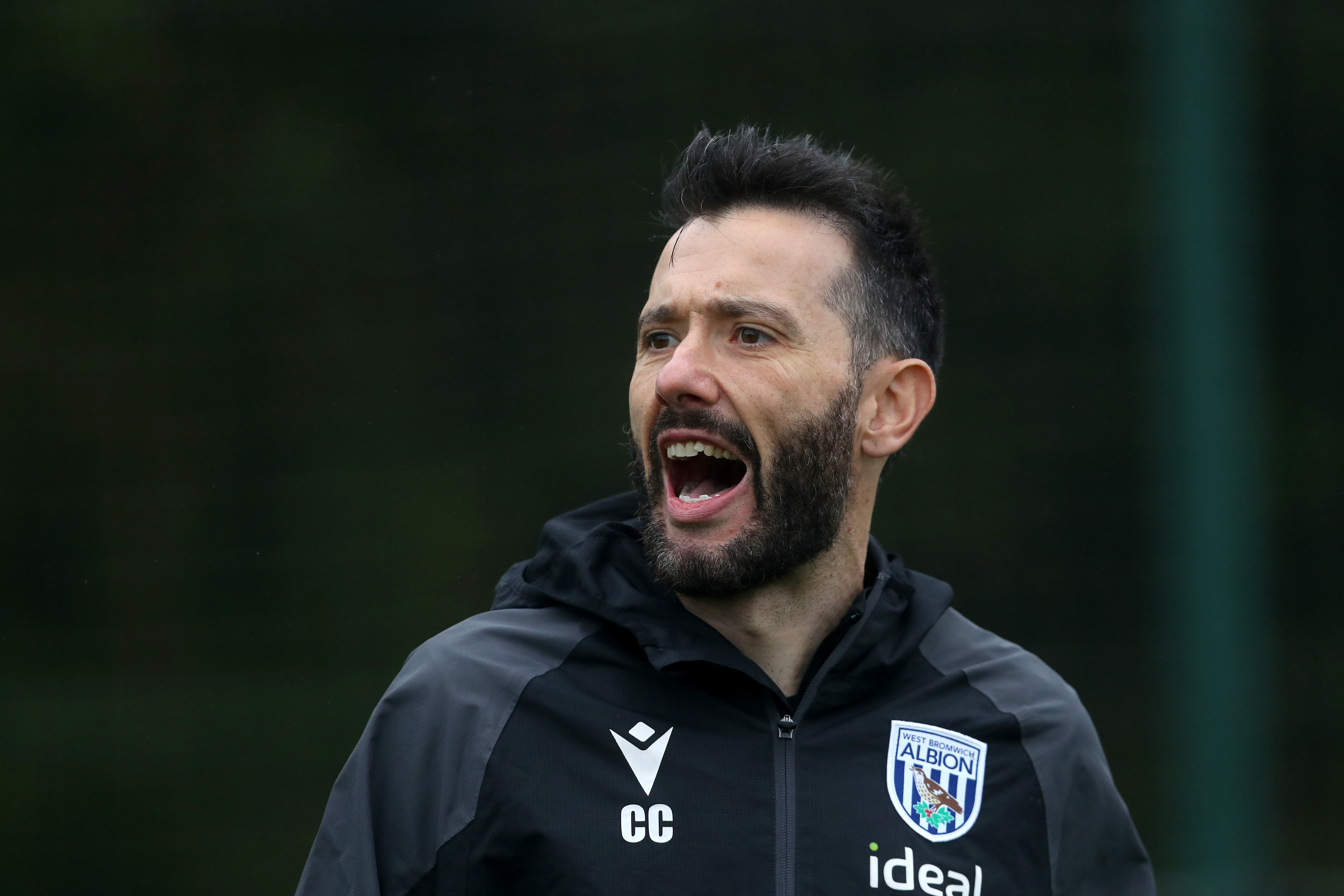 Carlos Corberán shouting instructions during a training session 