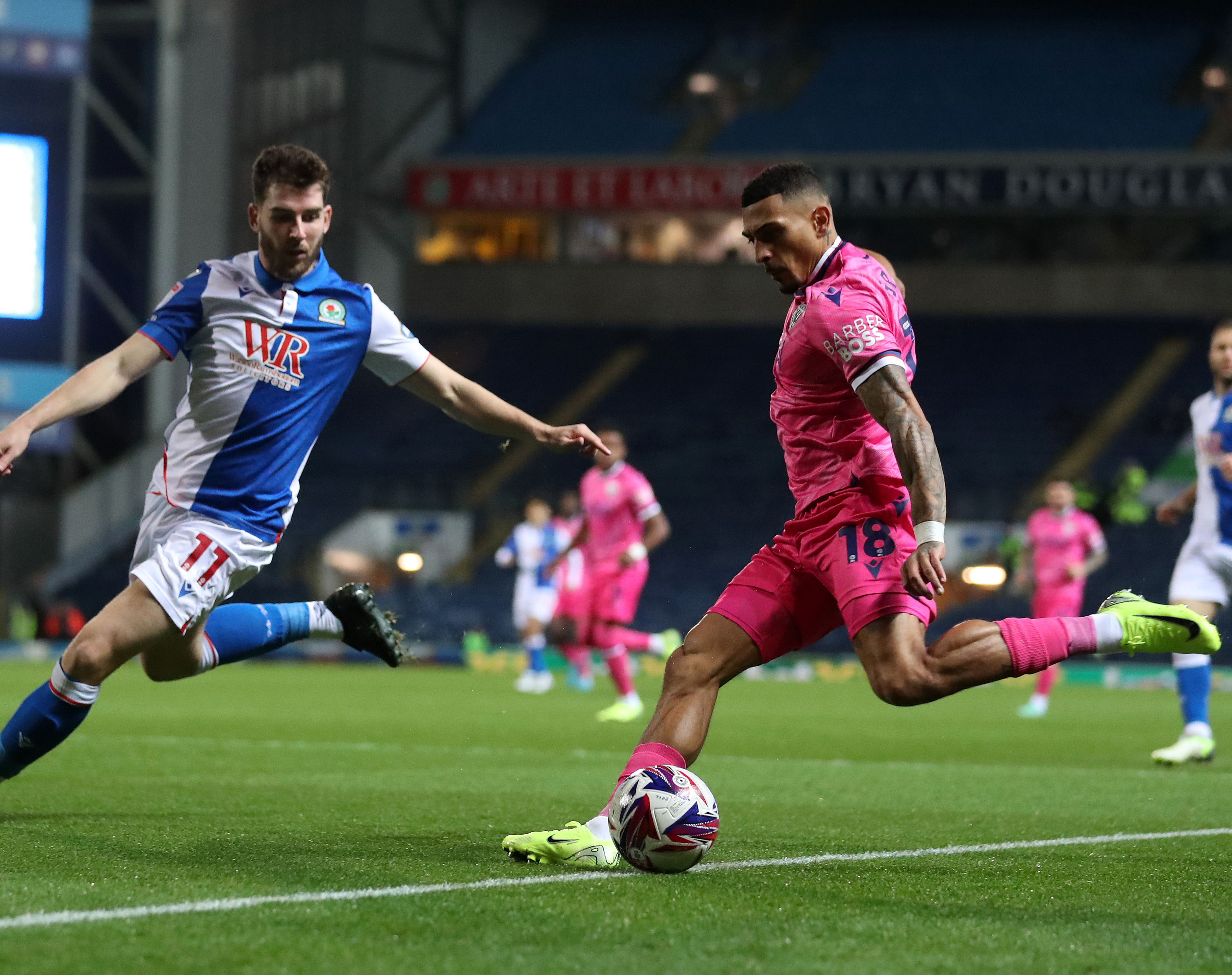 An image of Karlan Grant crossing a ball against Blackburn