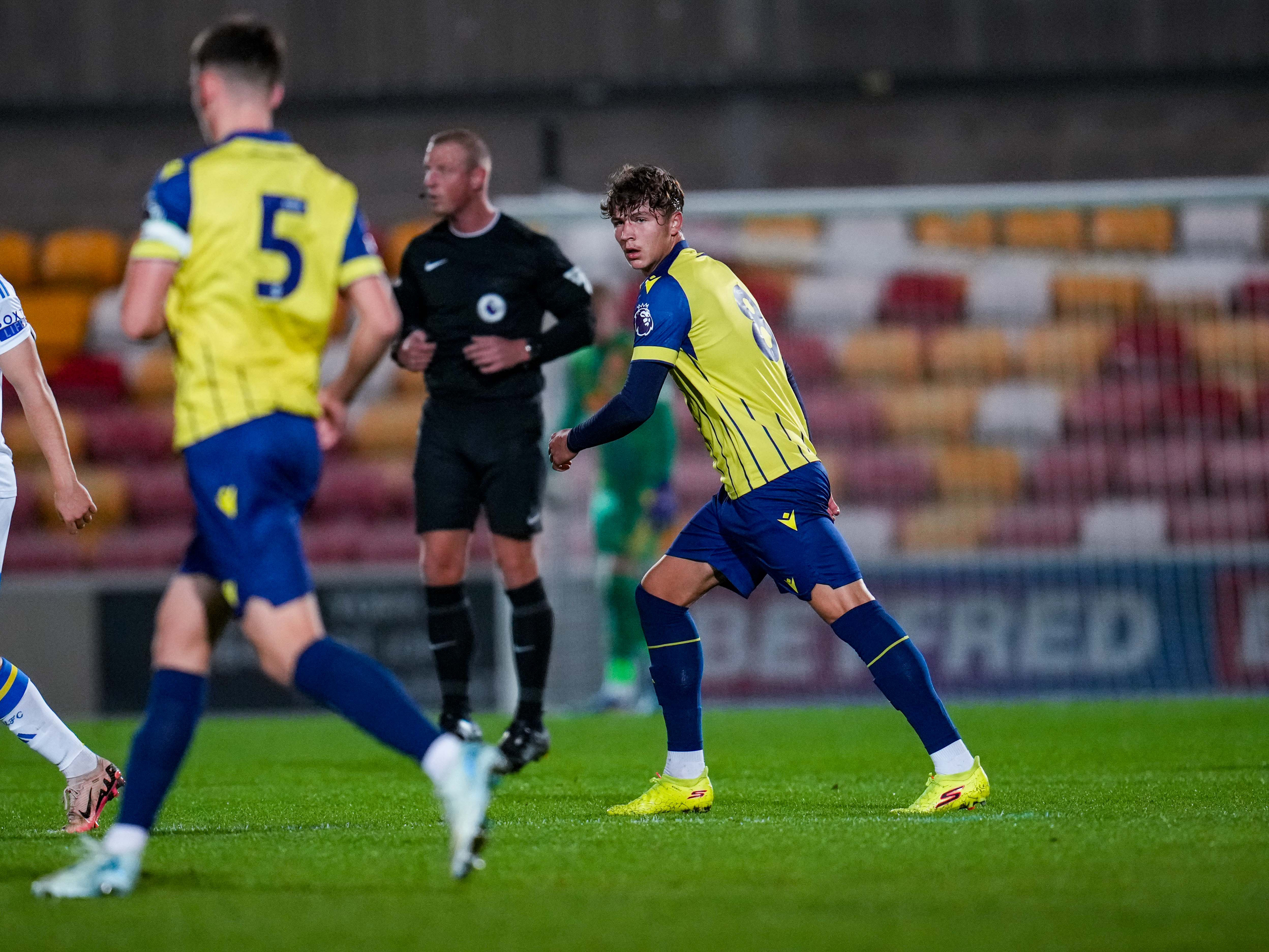 A photo of Albion U21s midfielder Cole Deeming, in the yellow and blue 2024/25 away kit